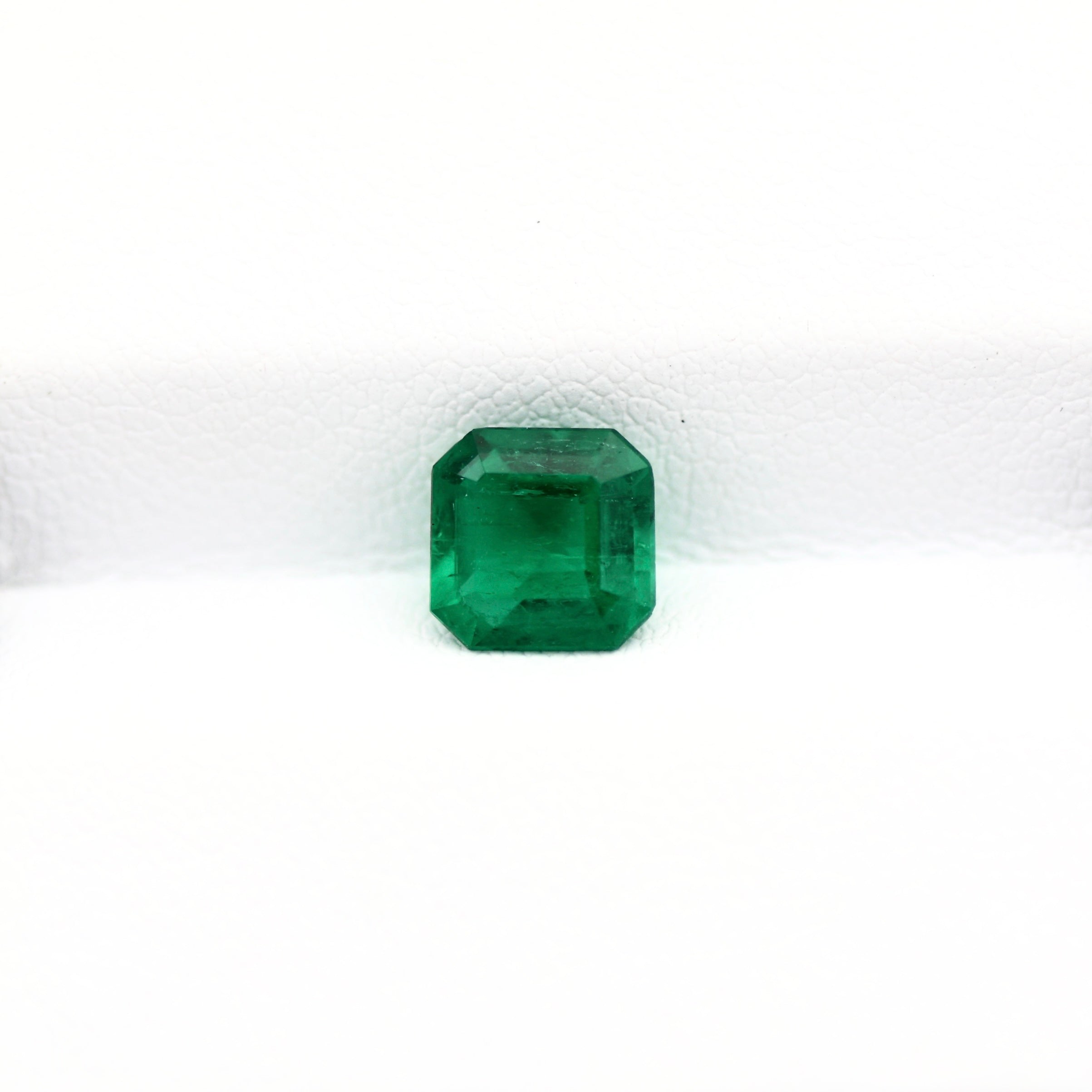 Dark green square colombian emerald