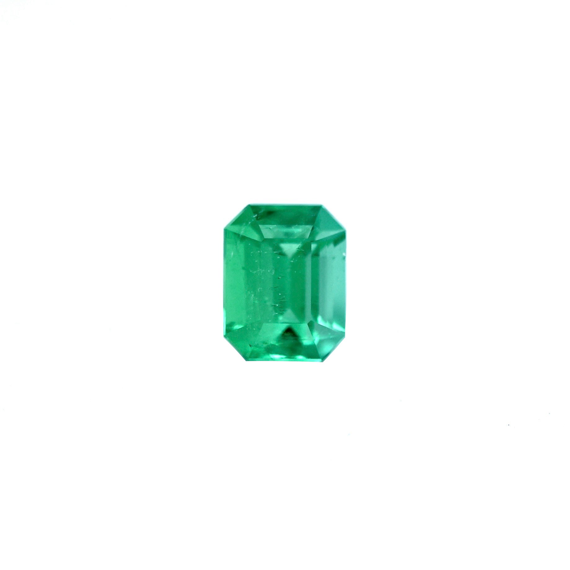 vivid green colombian emerald cut 1.95 ct