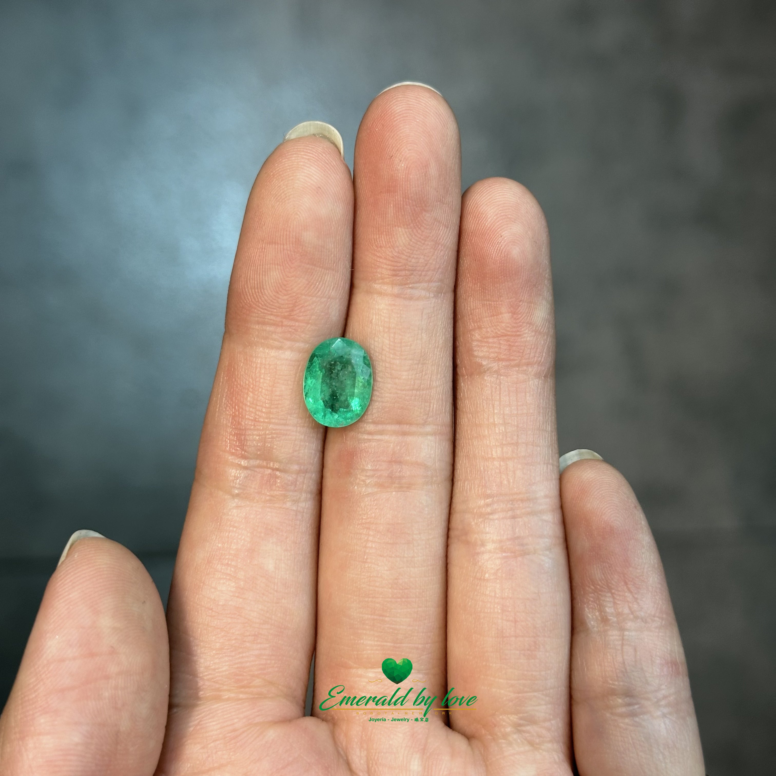 Oval-shaped Colombian emerald weighing 2.66 ct, featuring bright green tone and crystal-like purity