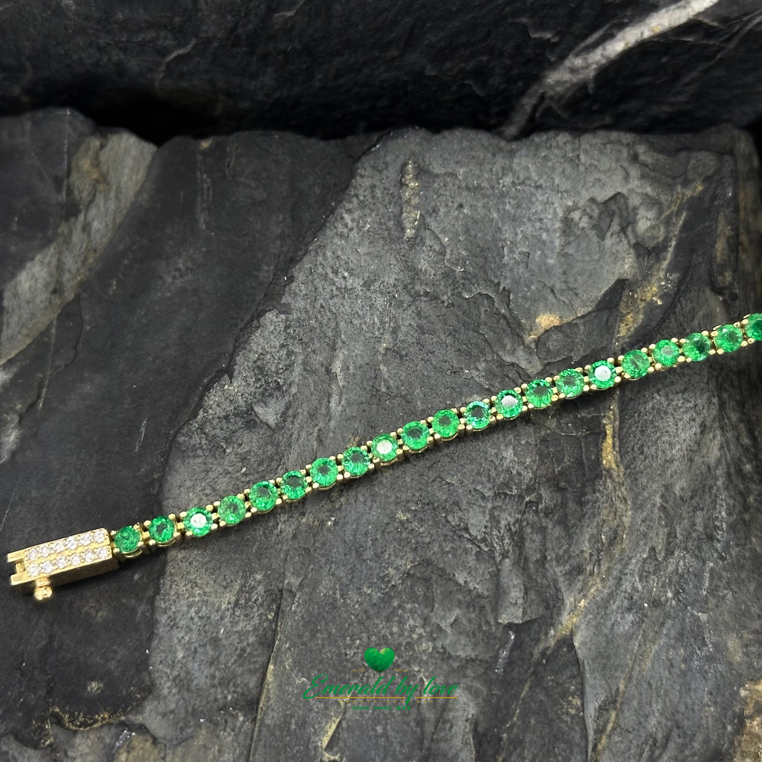 Slim Tennis Bracelet in 18K Yellow Gold with Prong-Set Colombian Emeralds and Diamond Clasp