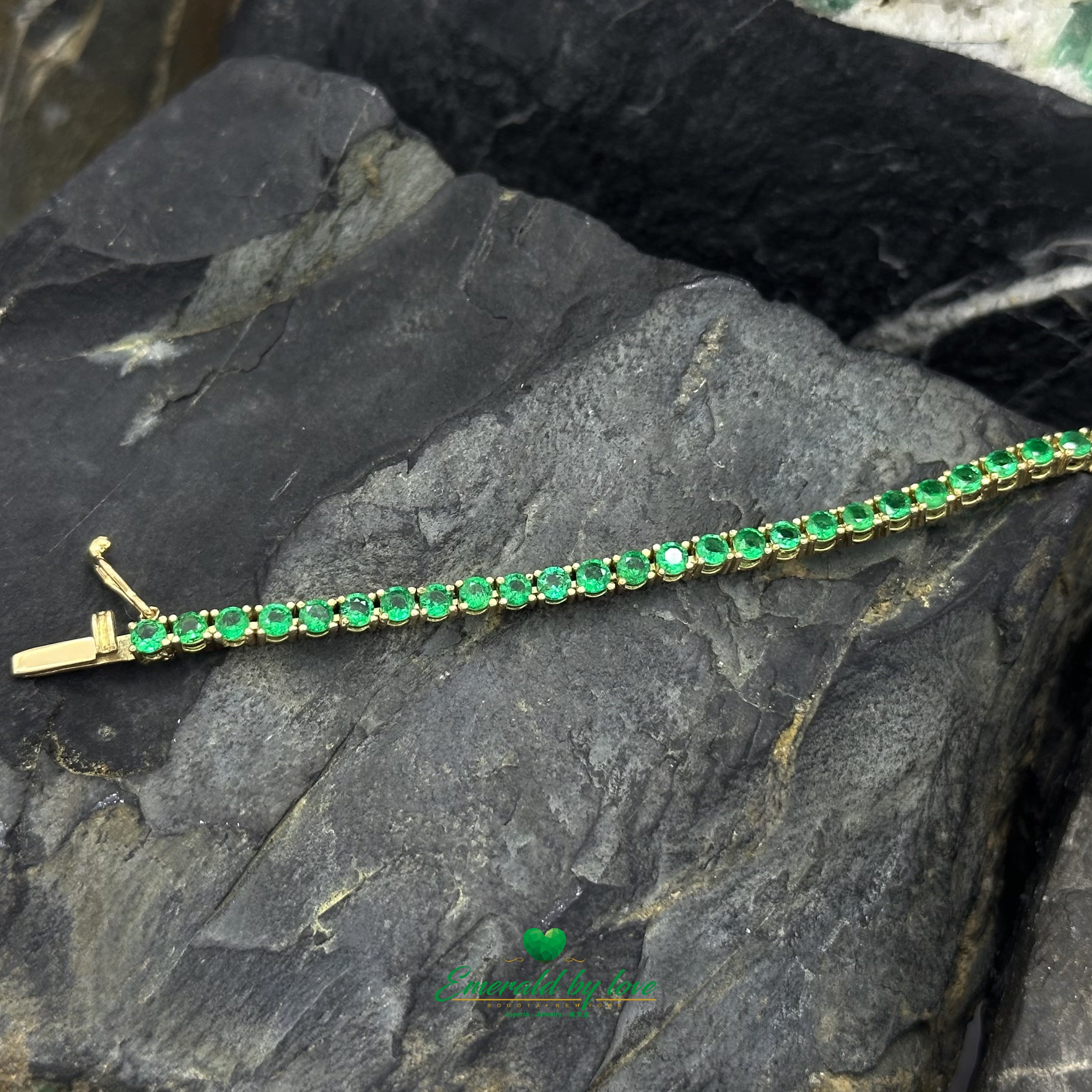Slim Tennis Bracelet in 18K Yellow Gold with Prong-Set Colombian Emeralds and Diamond Clasp