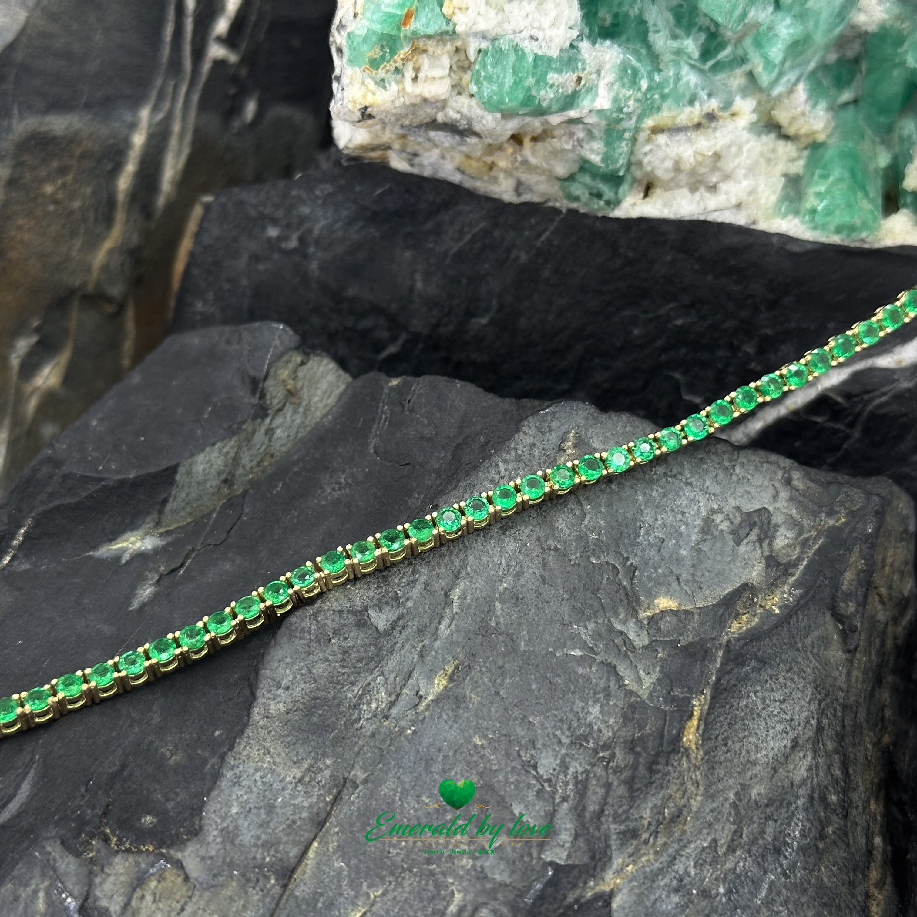 Slim Tennis Bracelet in 18K Yellow Gold with Prong-Set Colombian Emeralds and Diamond Clasp