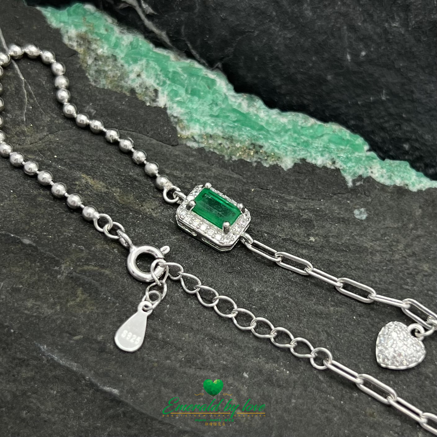 Sterling Silver Bracelet with Double Charm Featuring Colombian Baguette Emerald