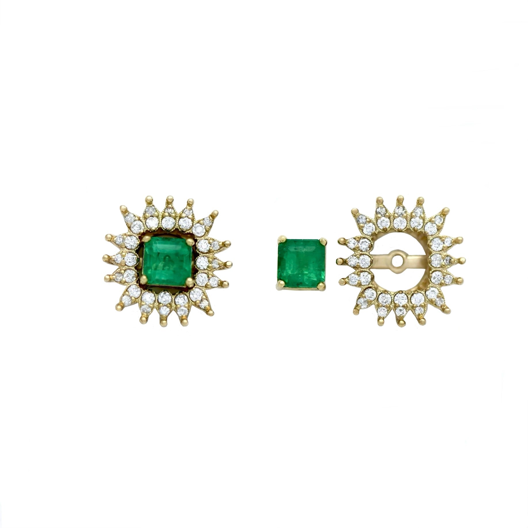 The vibrant green emerald at the center contrasts beautifully with the sparkle of the diamonds, making these earrings perfect for special occasions or as a refined statement piece.