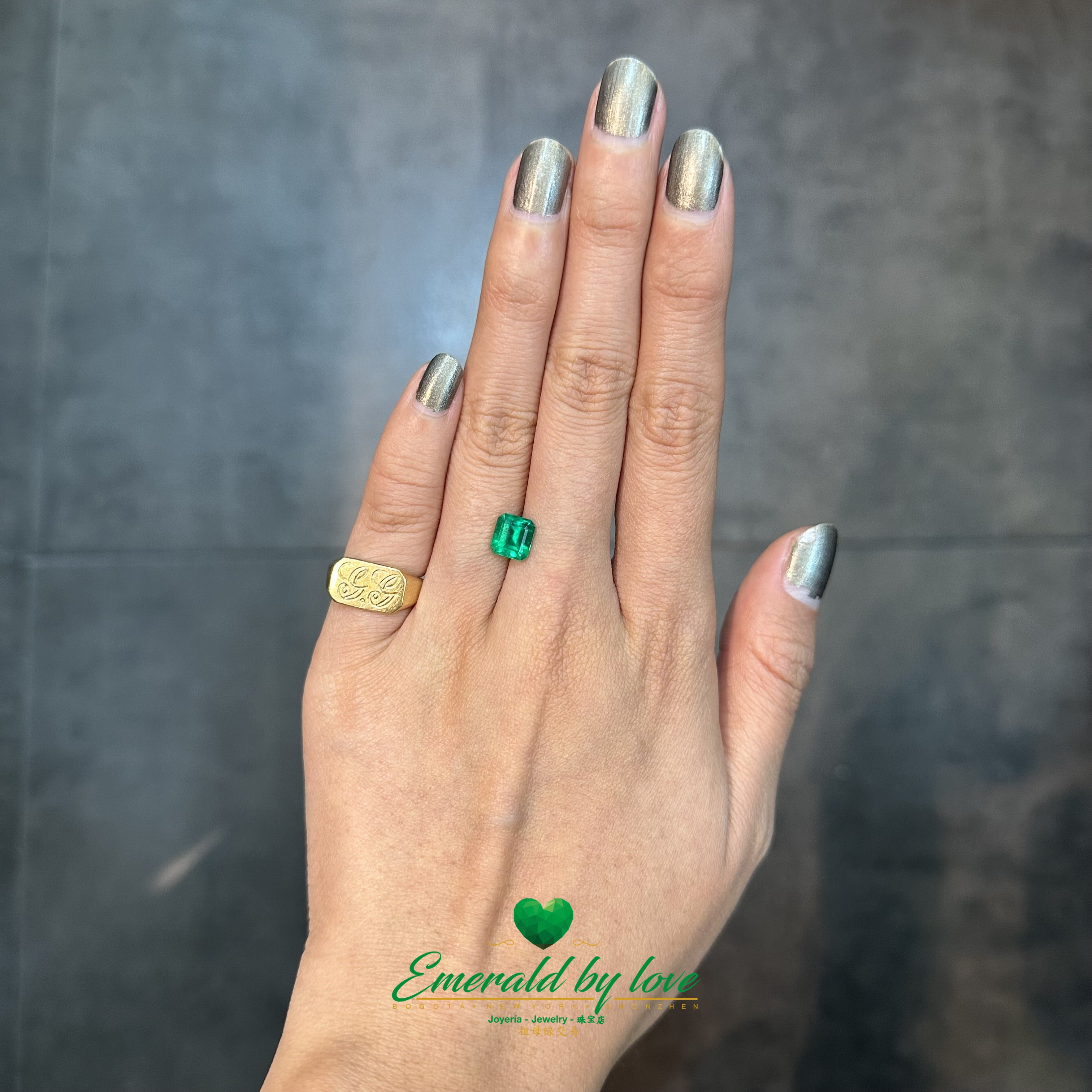 Square Colombian emerald weighing 1.52 carats, glowing with intense green brilliance