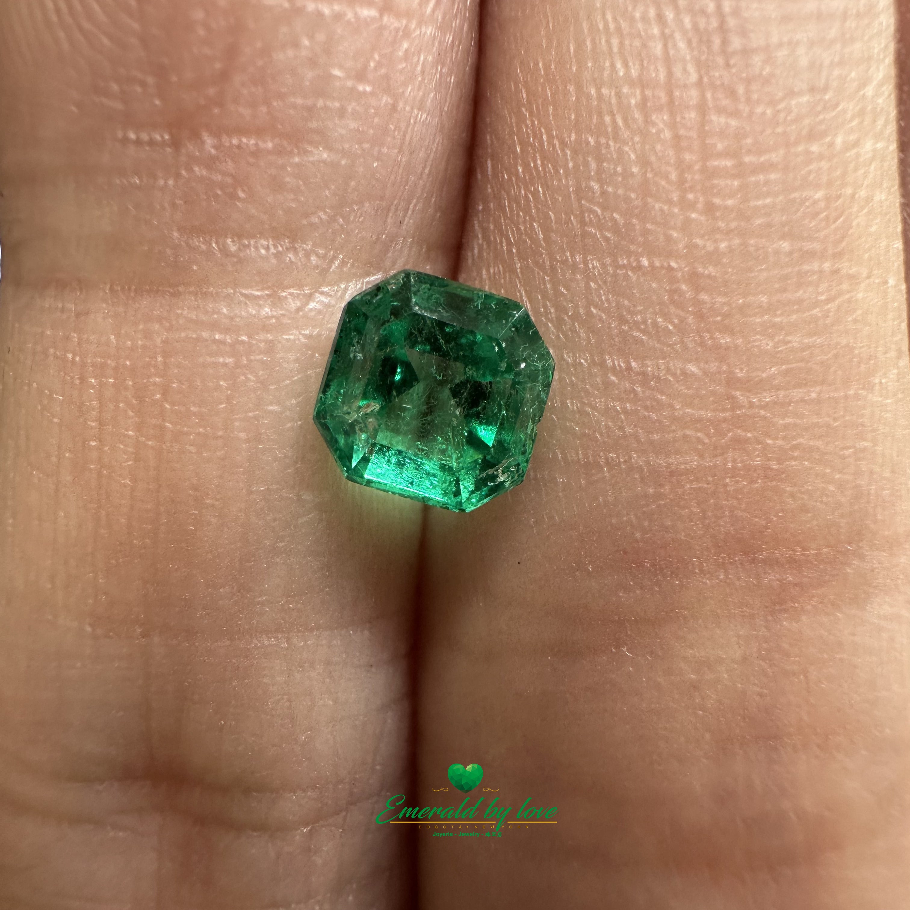 Fine 0.82 carat Colombian emerald, square cut, with glowing green tone and precision cut