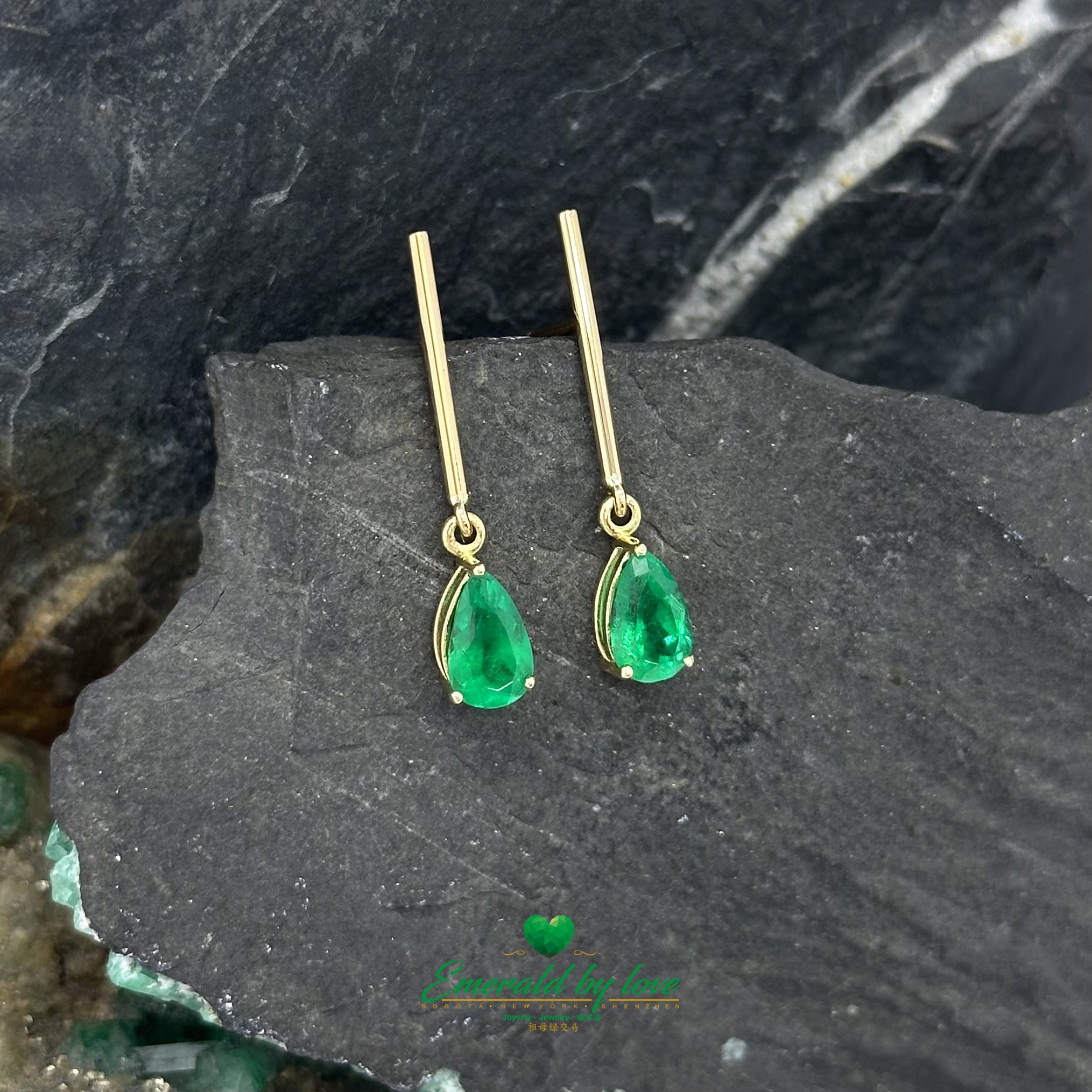 Long Yellow Gold Earrings with Teardrop Emeralds