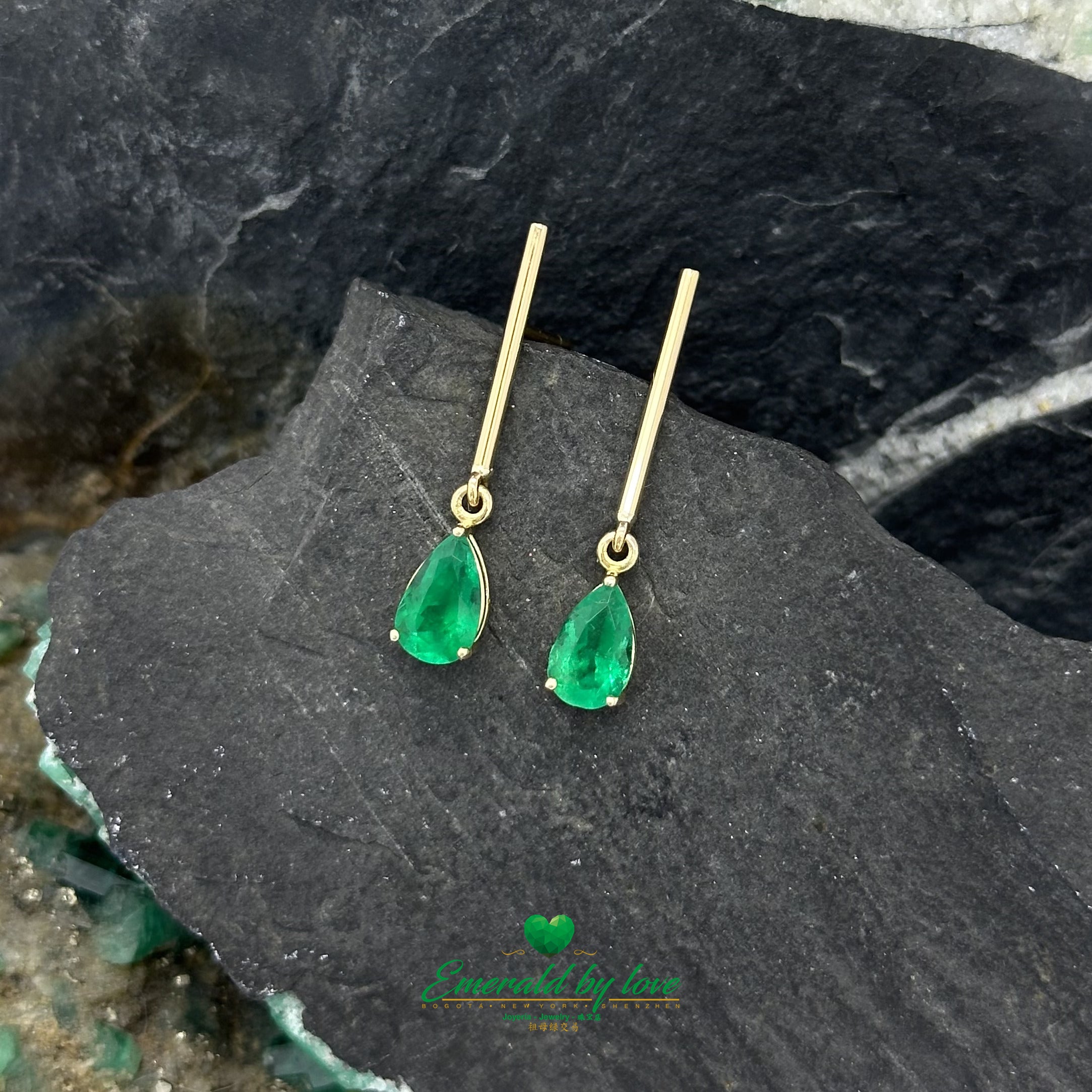 Long Yellow Gold Earrings with Teardrop Emeralds