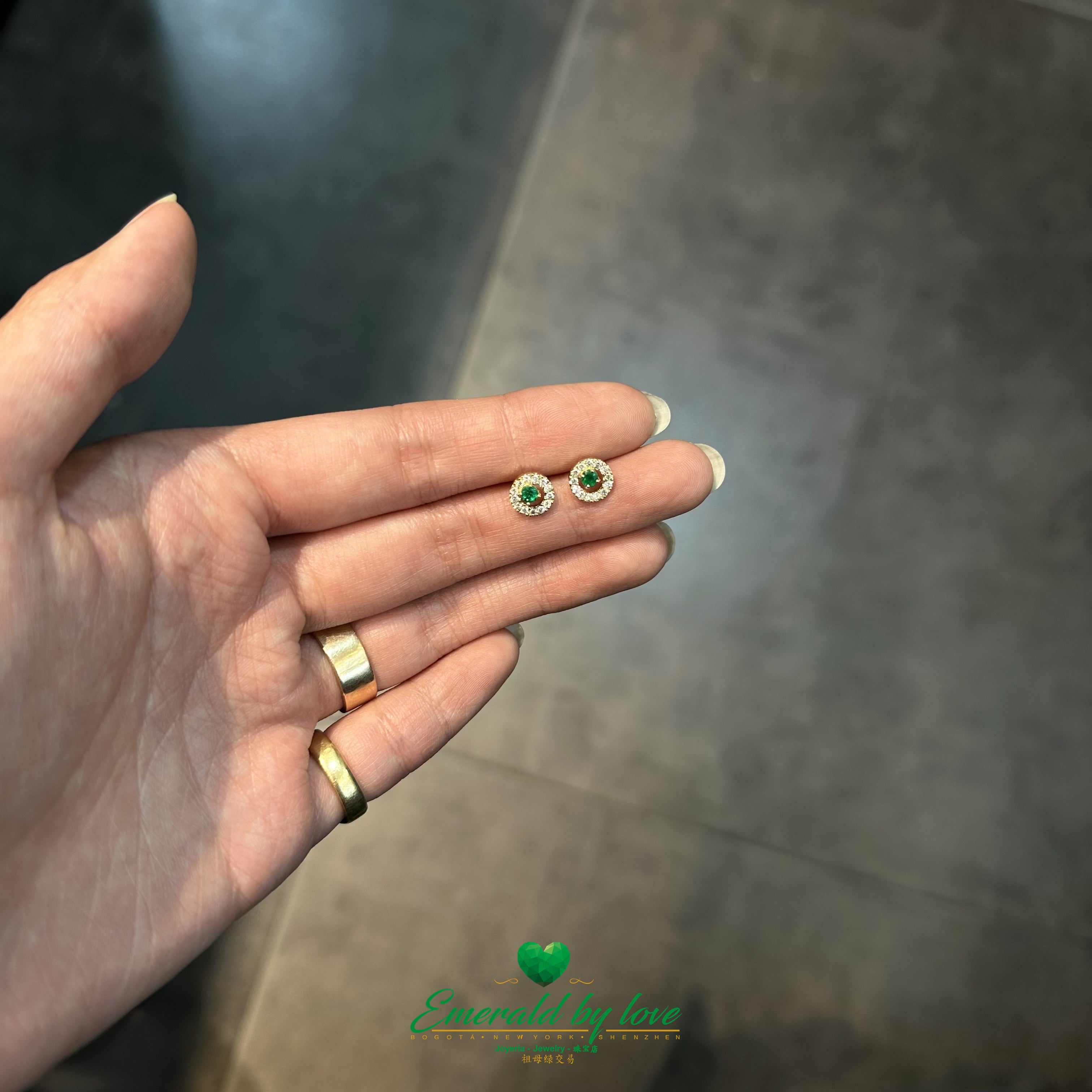 Round Emerald and Diamond Halo Earrings in 18K Yellow Gold