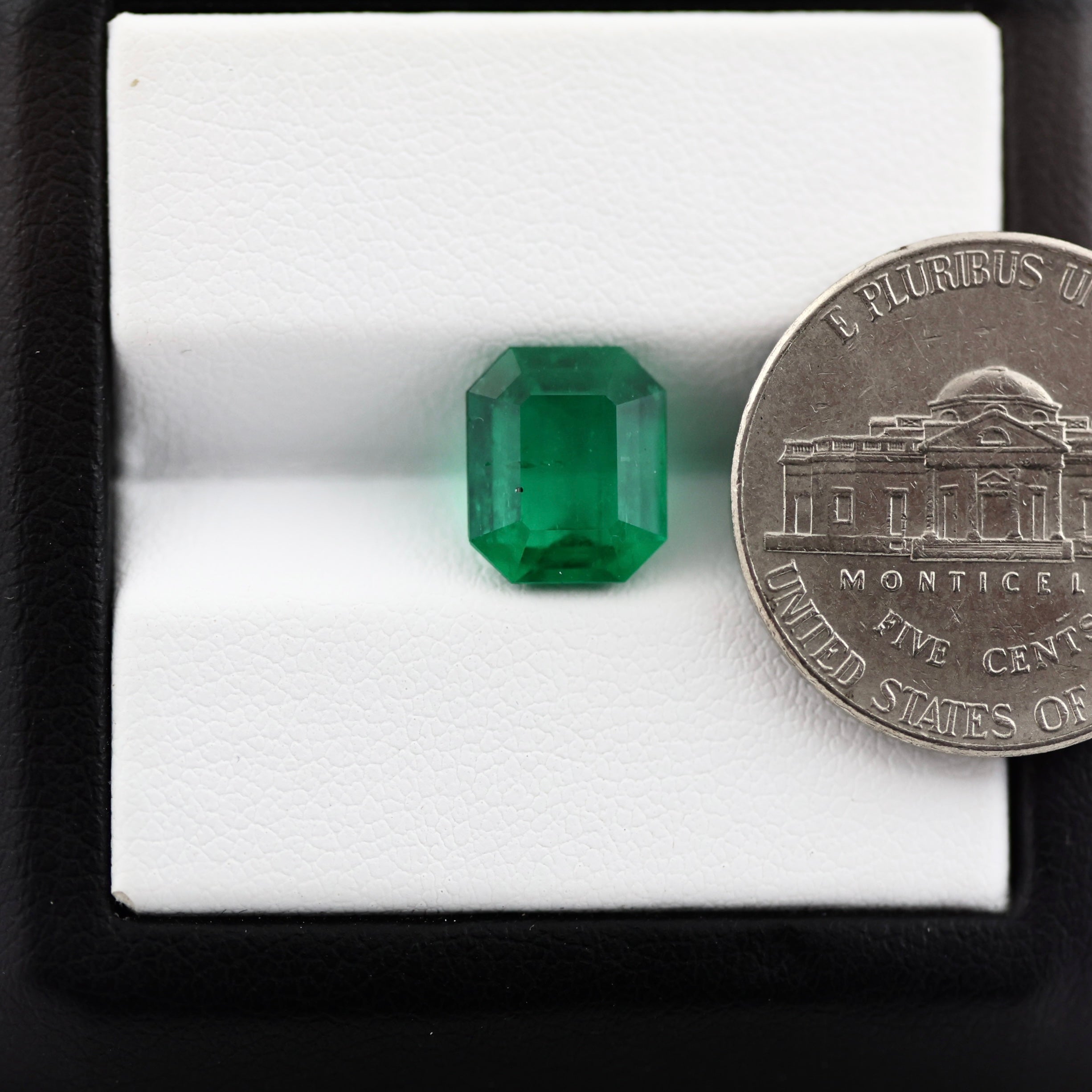 beautiful colombian emerald measurements with coin