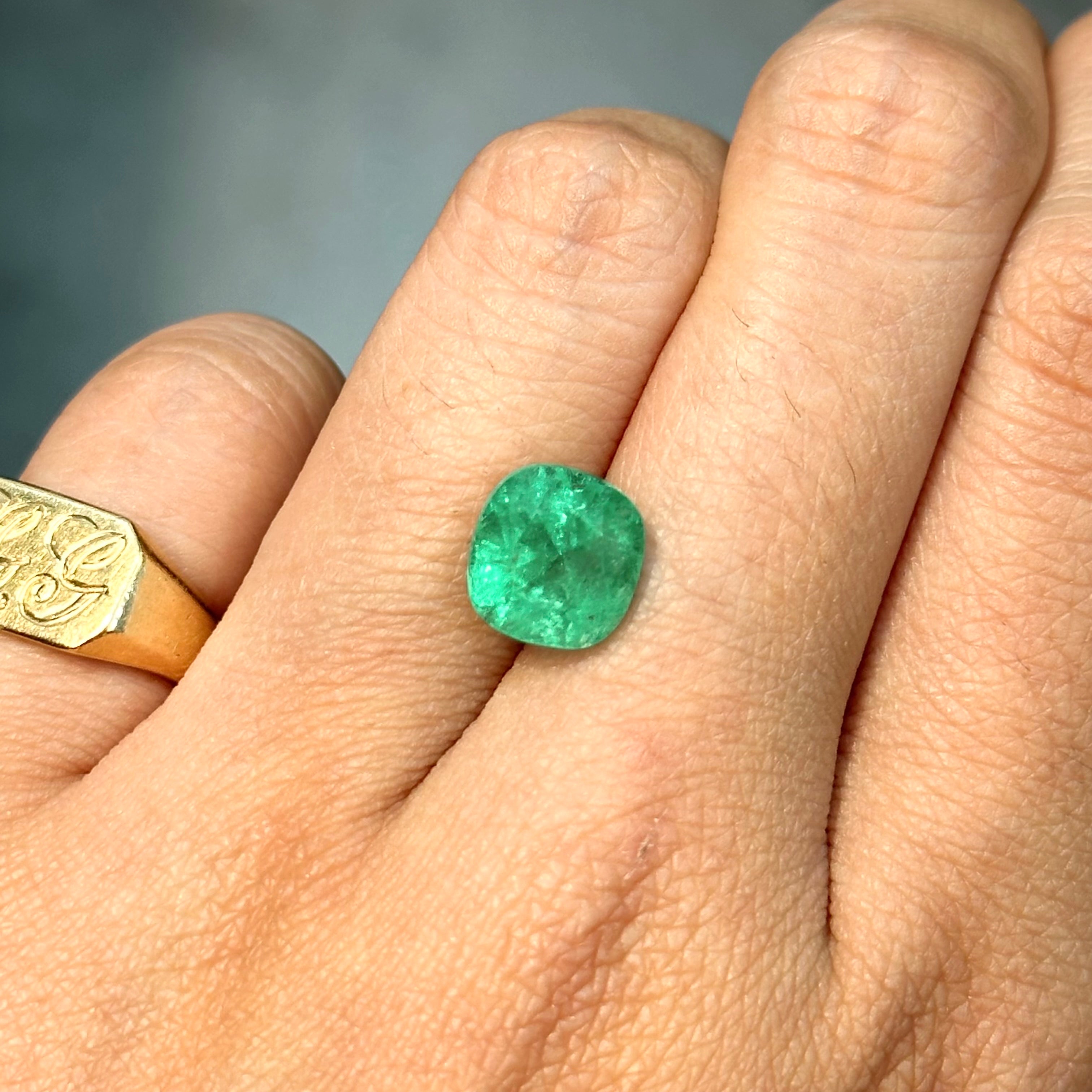 Genuine 3.43 carat Colombian emerald in cushion cut with intense green saturation and beauty
