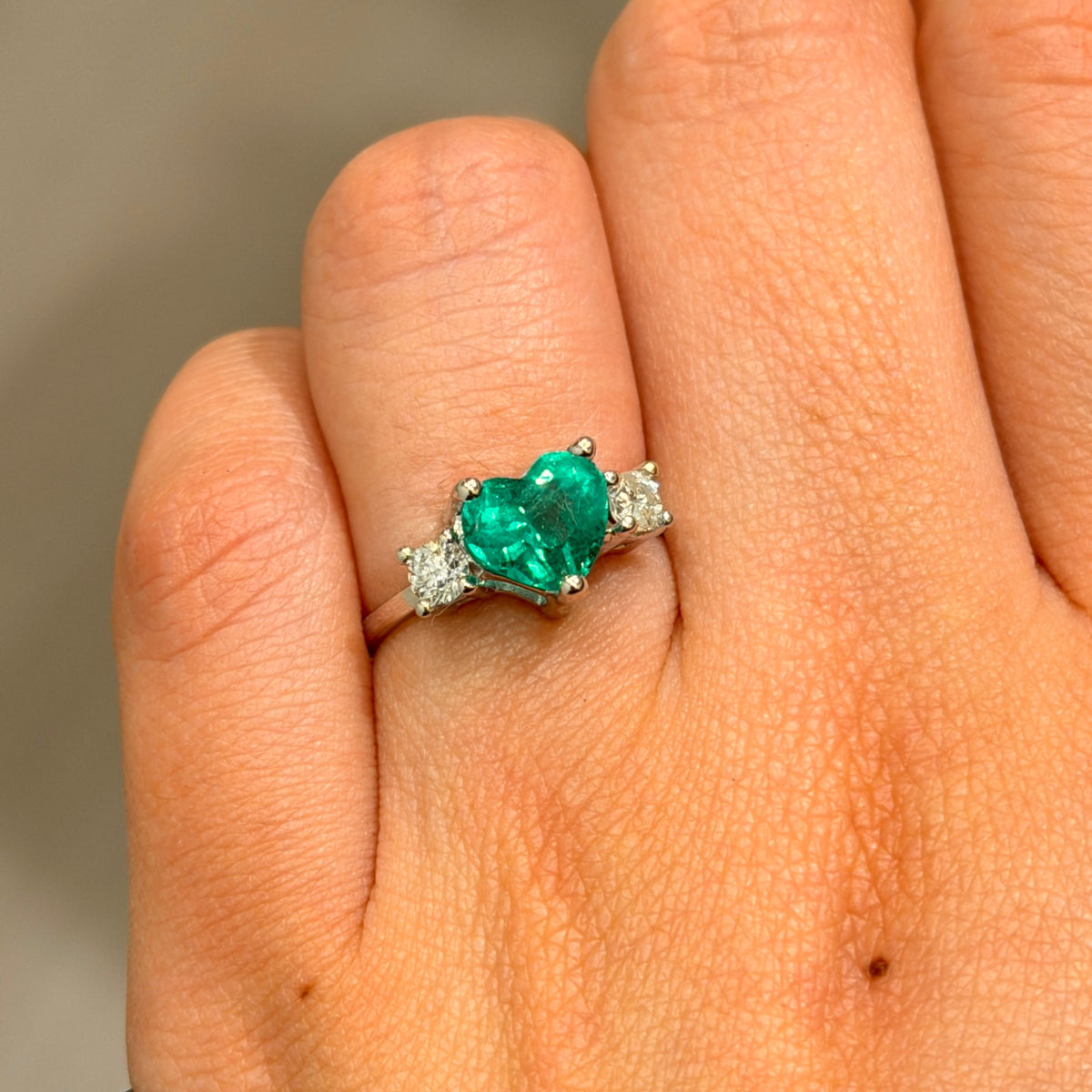 Heart-Shaped Colombian Emerald Engagement Ring with Side Diamonds