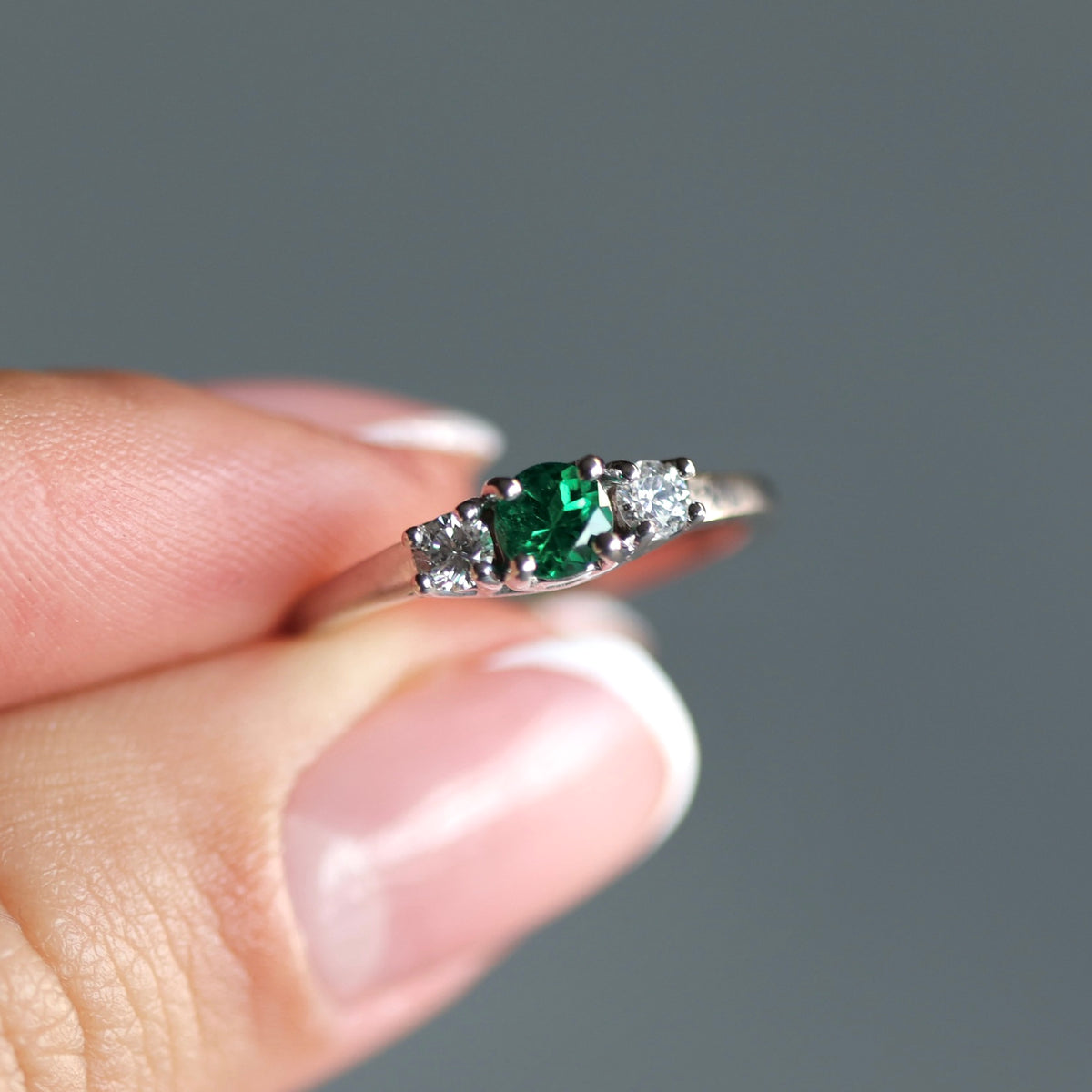 White Gold Ring with Round Colombian Emerald and Matching Round Diamonds