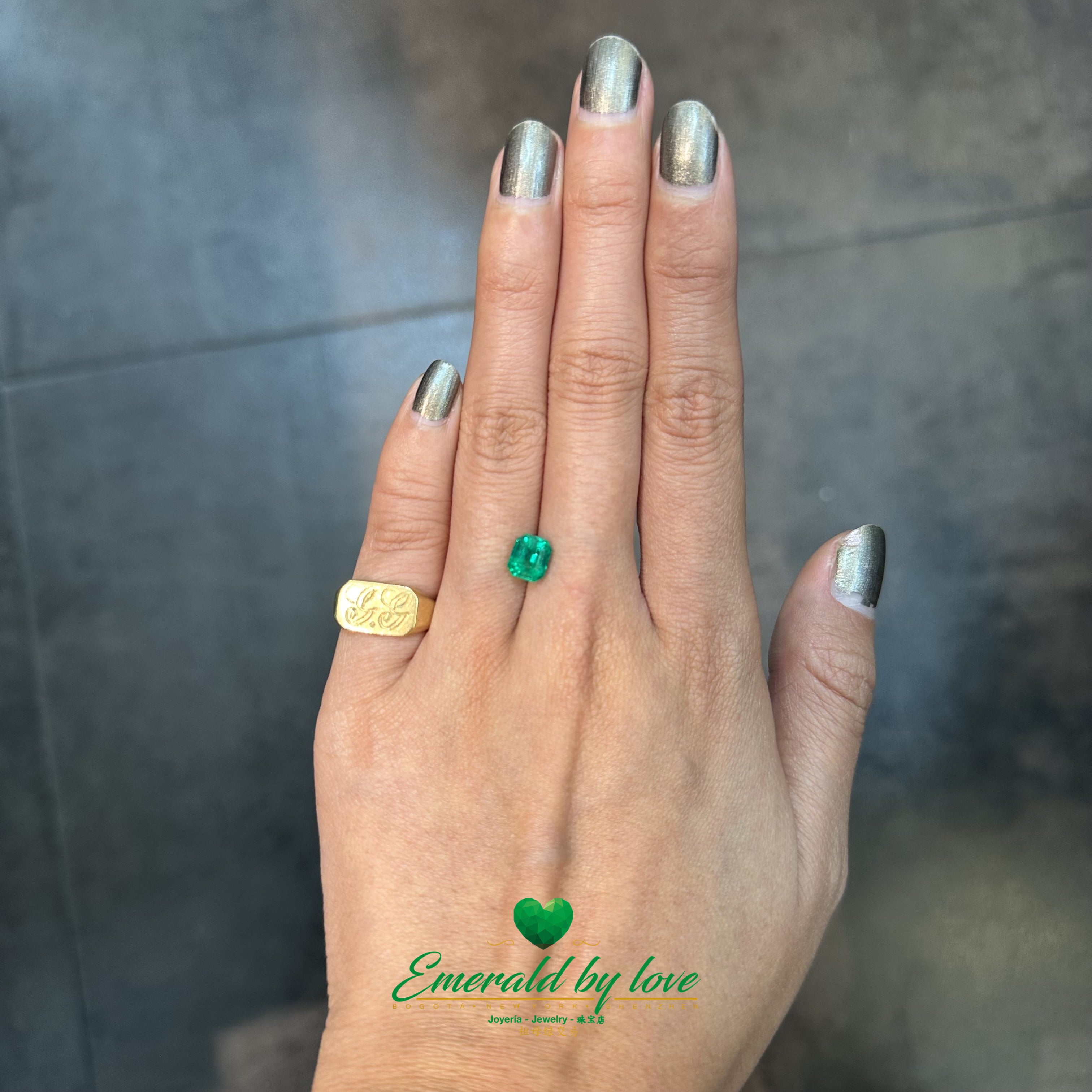 1.24 ct Colombian emerald featuring deep green color and sharp emerald cut facets
