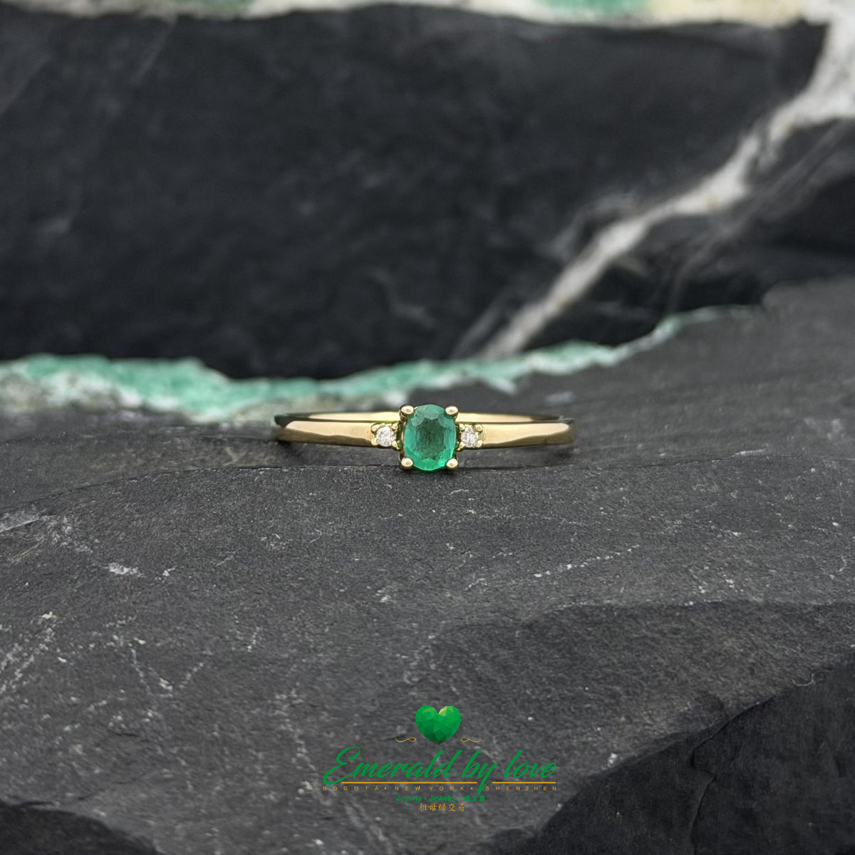 Minimalist Ring with Oval Emerald and Diamonds