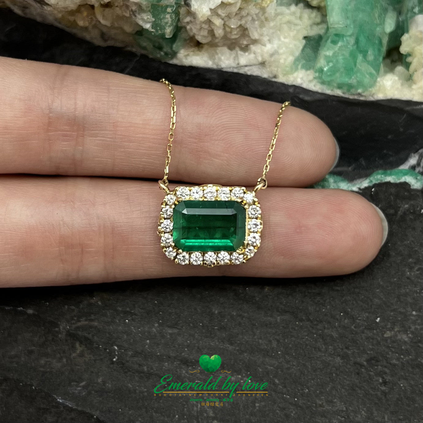 Stunning Yellow Gold Marquise Pendant with 1.85 Ct Emerald Cut Emerald and Diamond Halo