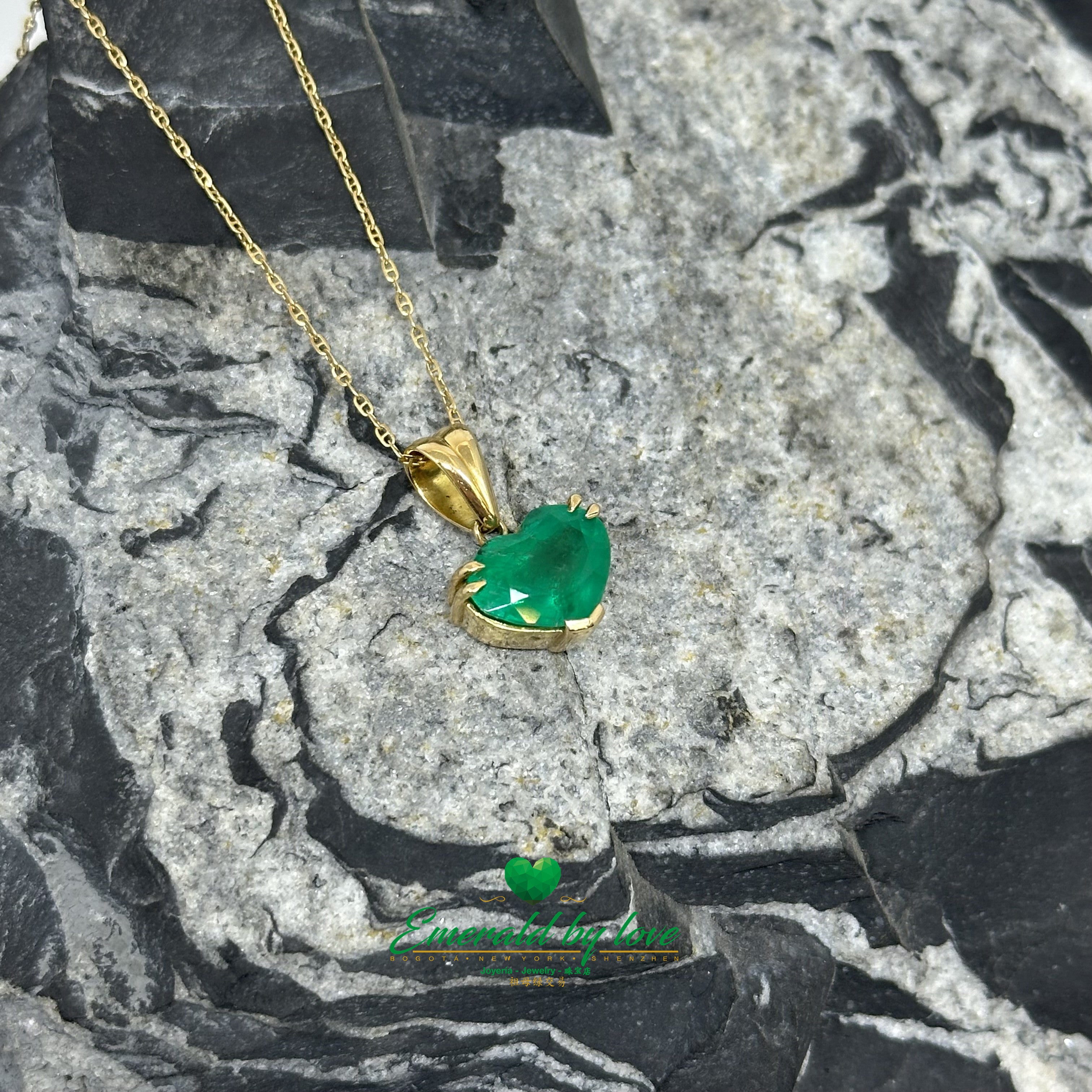 Heart-Shaped Colombian Emerald Pendant with Double Prong Top and V-Prong Bottom