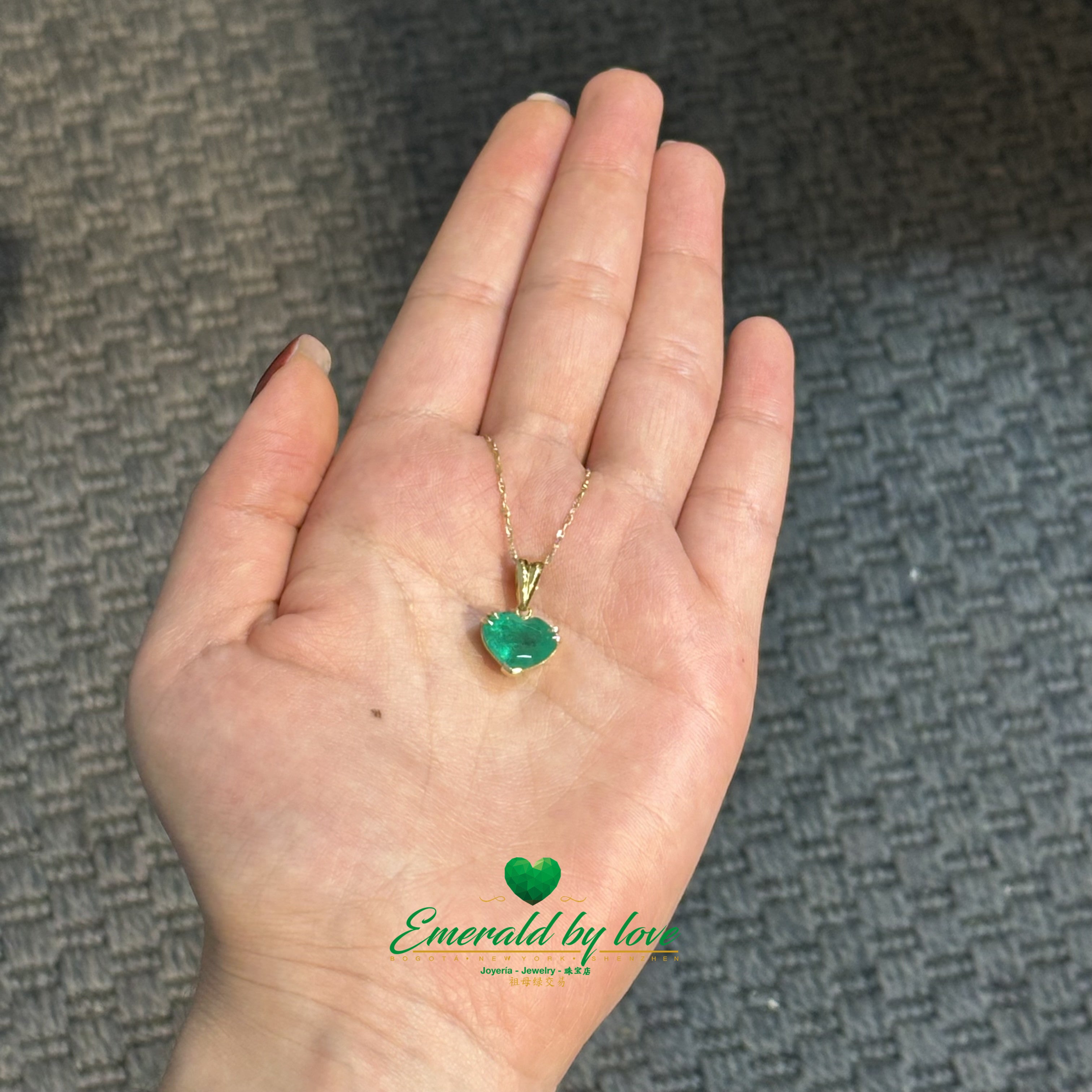 Heart-Shaped Colombian Emerald Pendant with Double Prong Top and V-Prong Bottom
