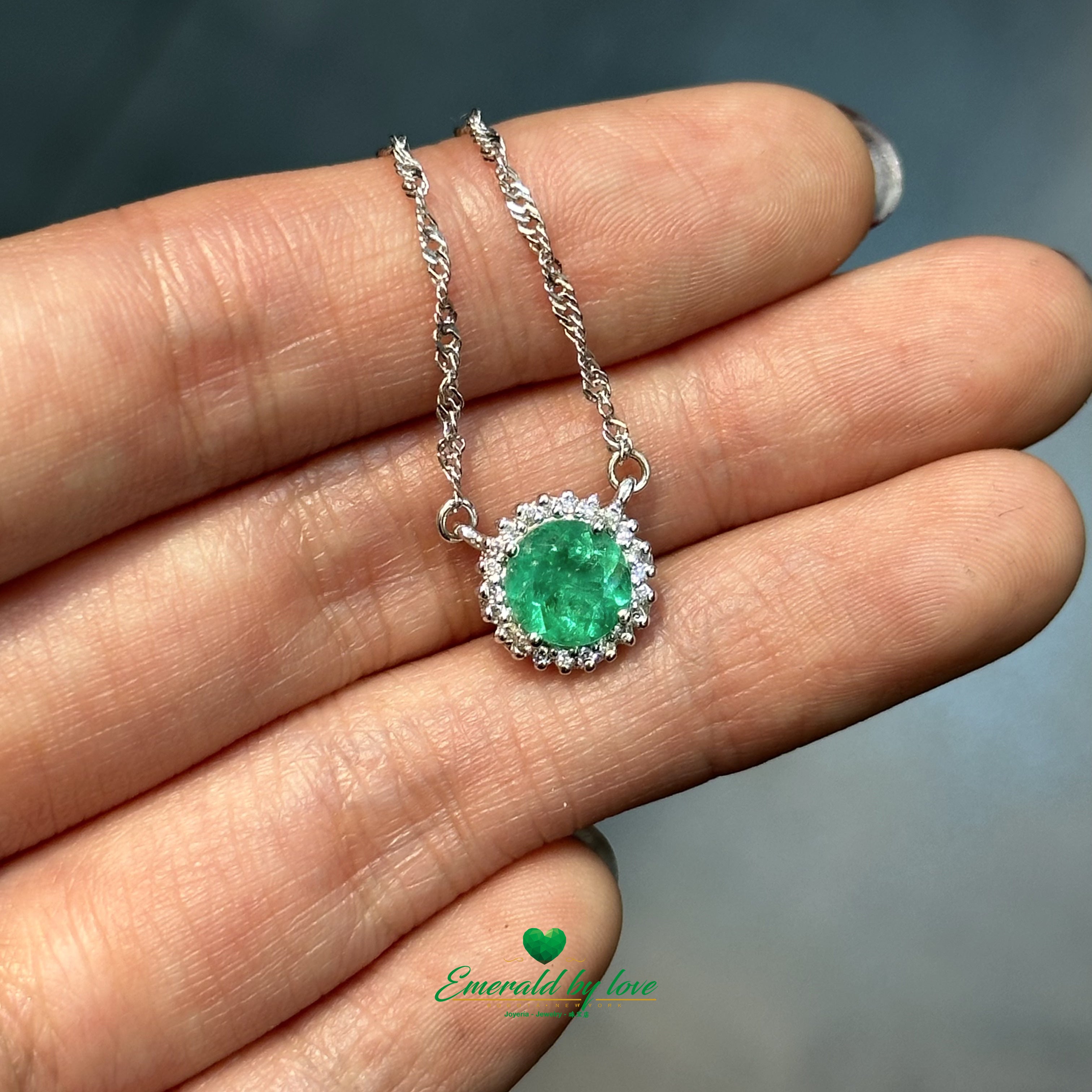 Floral Round Emerald and Diamond Halo Pendant in 18K White Gold