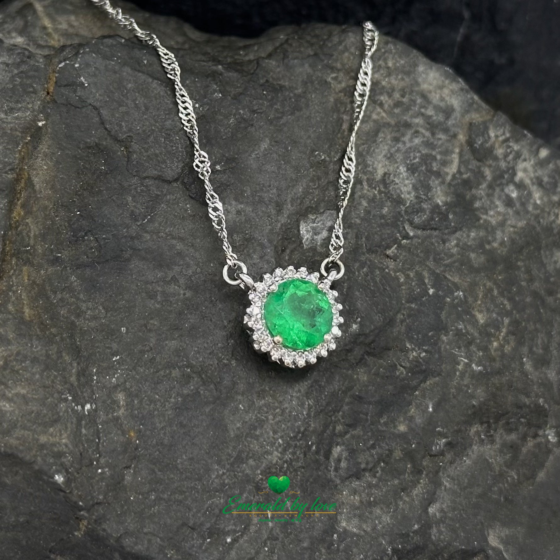 Floral Round Emerald and Diamond Halo Pendant in 18K White Gold