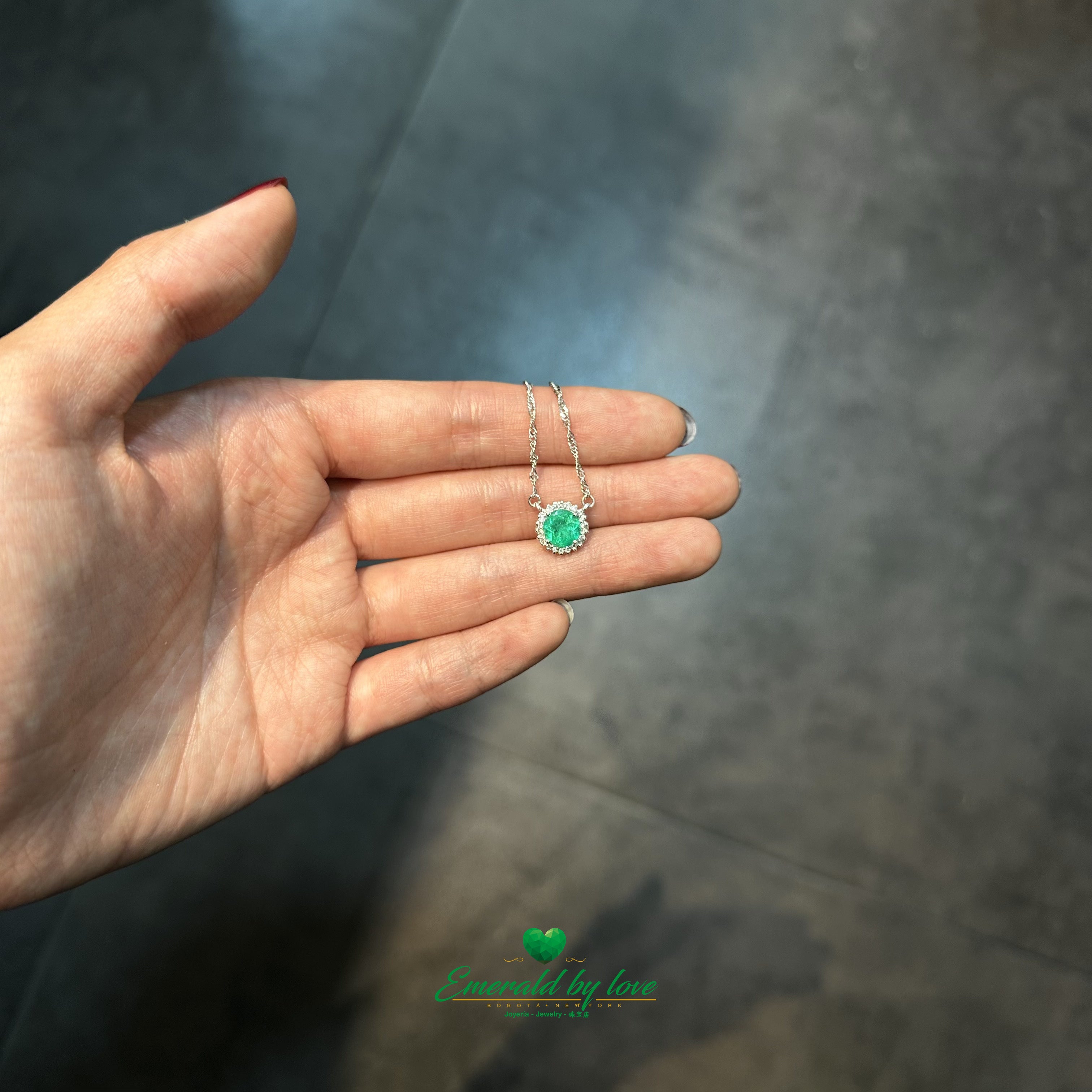 Floral Round Emerald and Diamond Halo Pendant in 18K White Gold