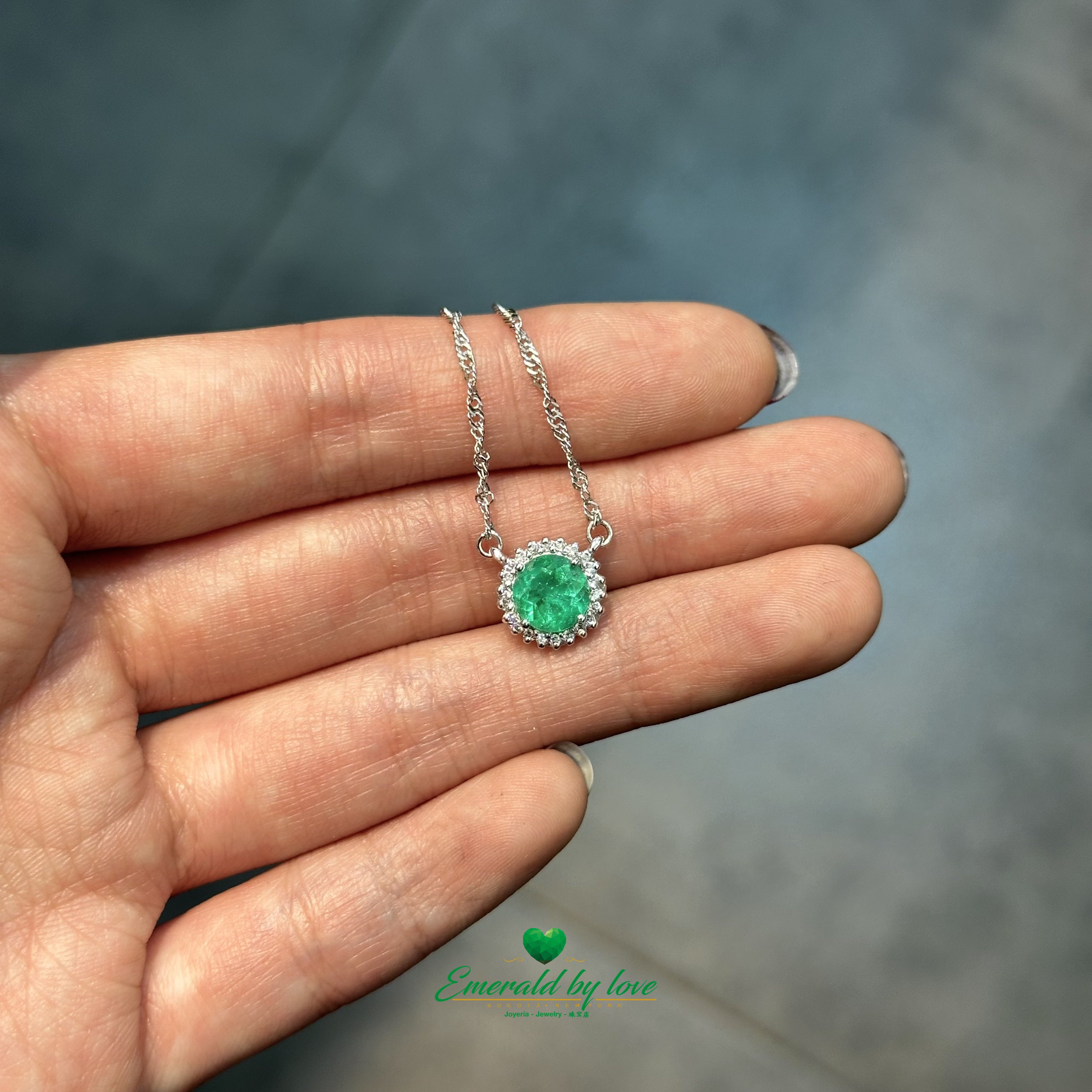 Floral Round Emerald and Diamond Halo Pendant in 18K White Gold
