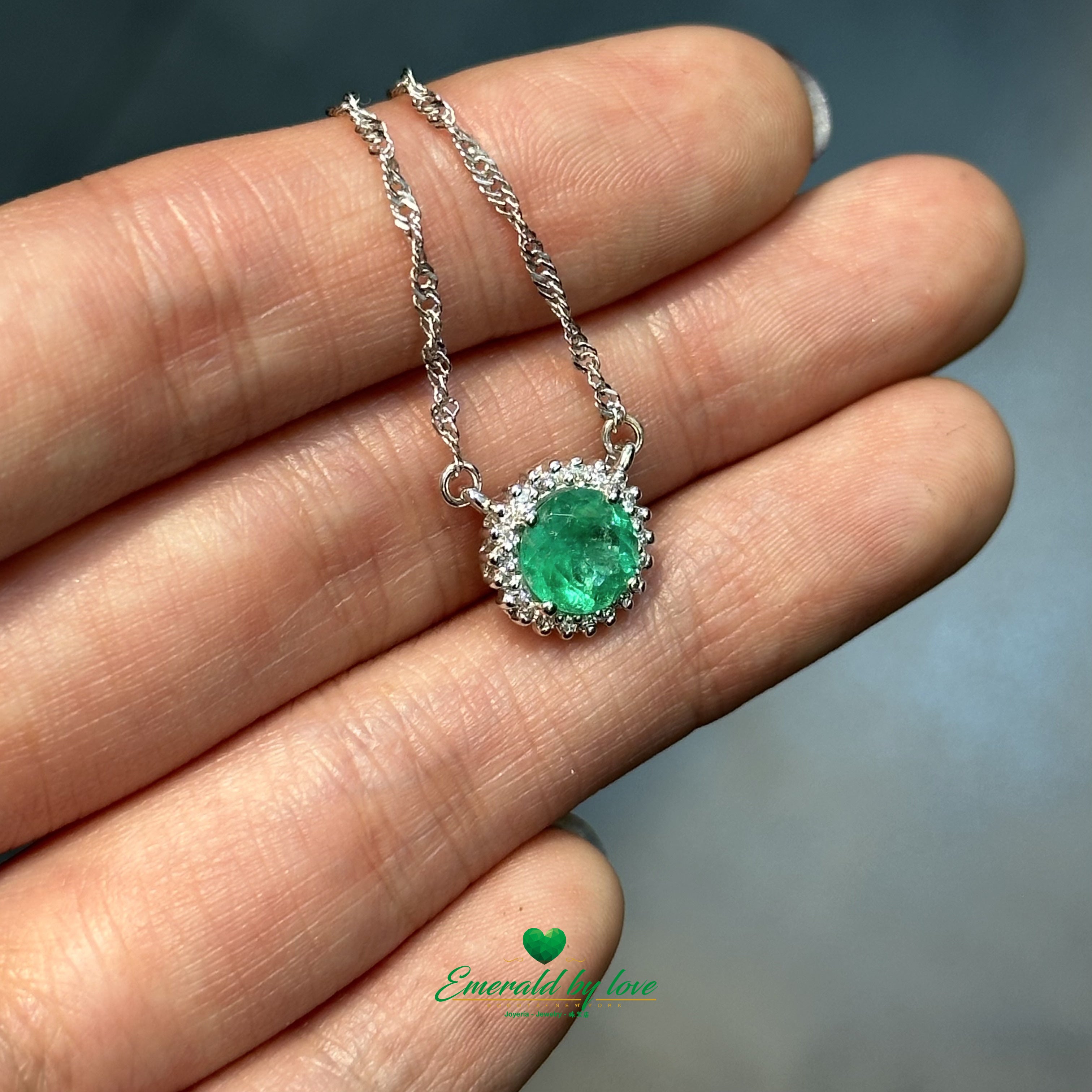 Floral Round Emerald and Diamond Halo Pendant in 18K White Gold