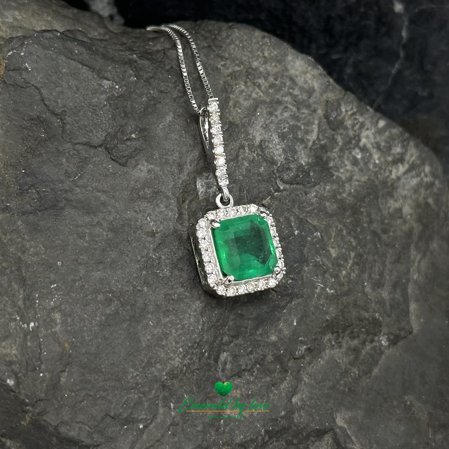 Elegant Emerald-Cut Colombian Emerald Pendant in 18K White Gold with Diamond Halo and Bail Accents