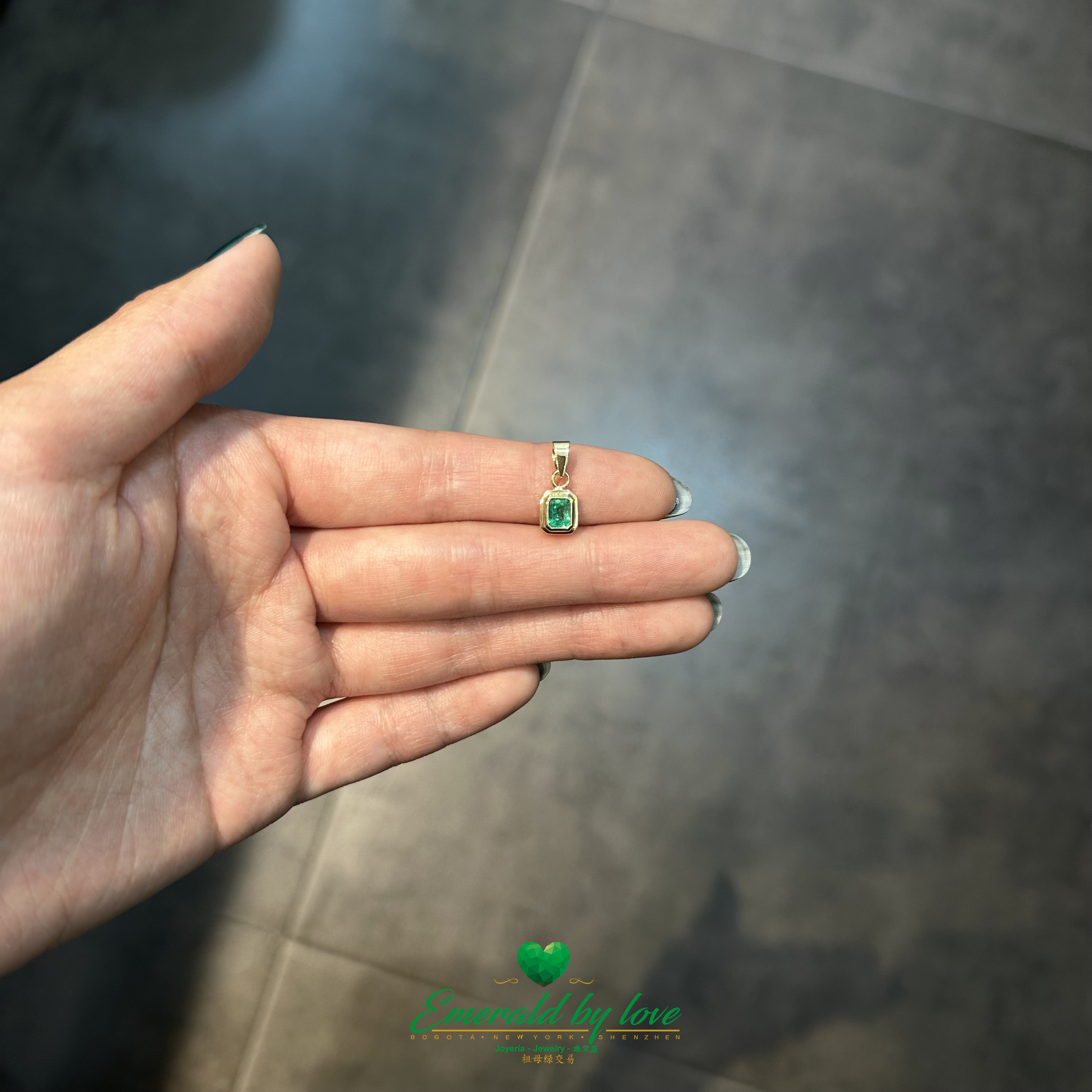 Rectangular Bezel-Set Emerald Pendant in 18K Yellow Gold