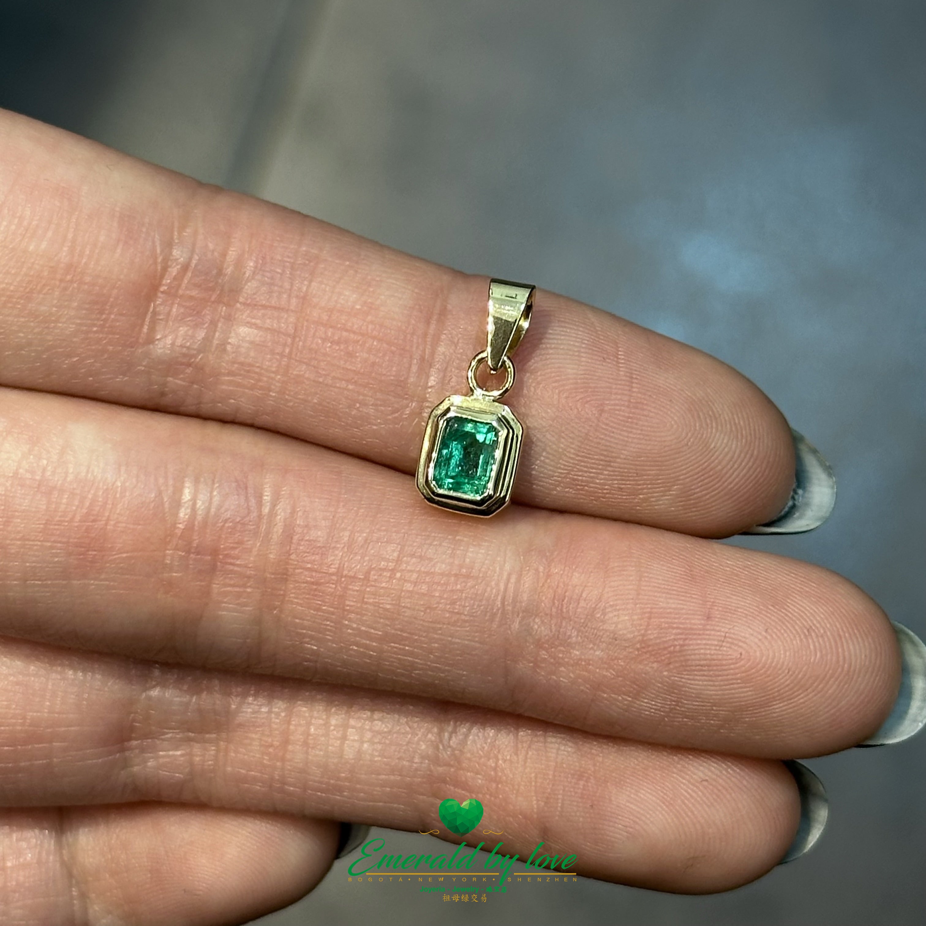 Rectangular Bezel-Set Emerald Pendant in 18K Yellow Gold