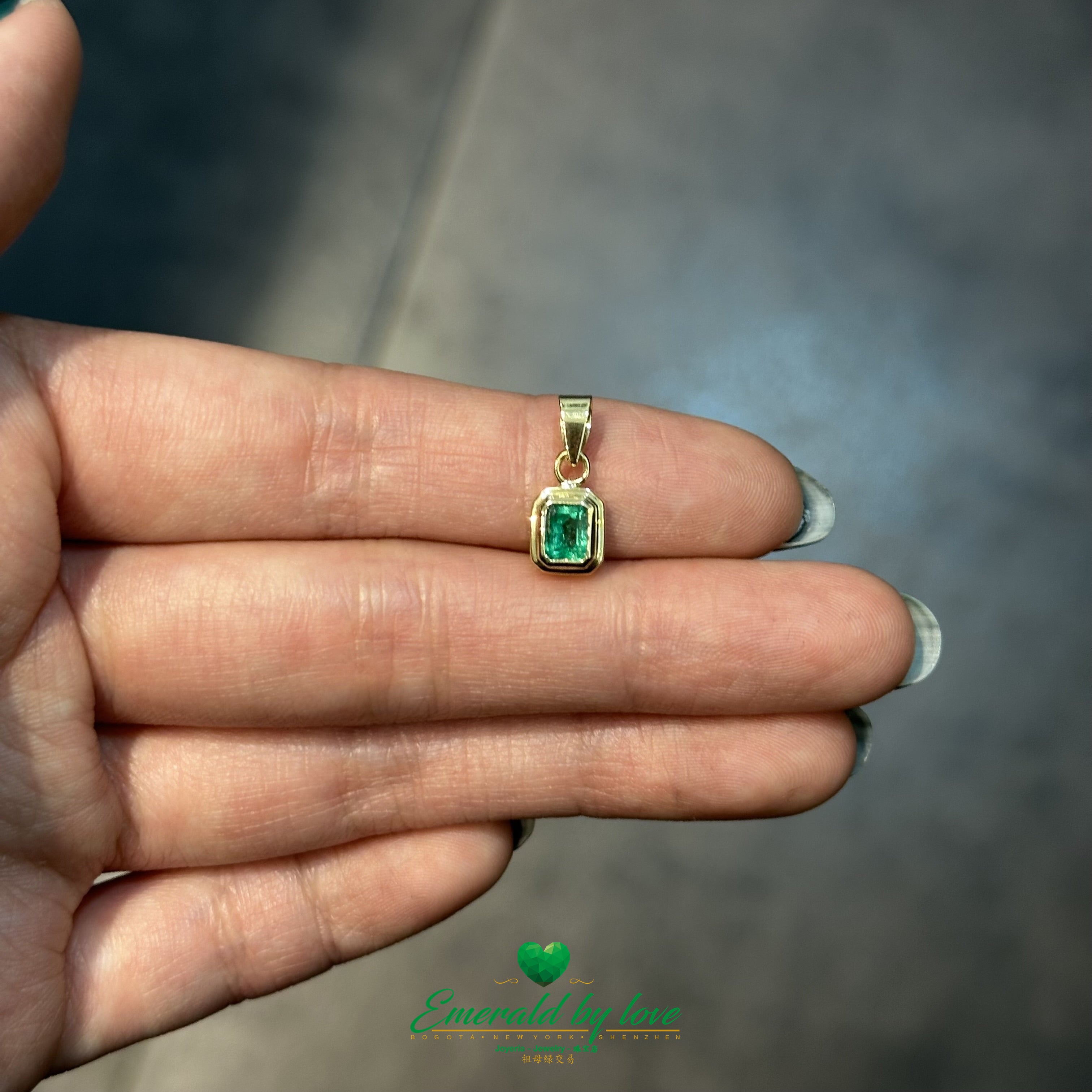 Rectangular Bezel-Set Emerald Pendant in 18K Yellow Gold