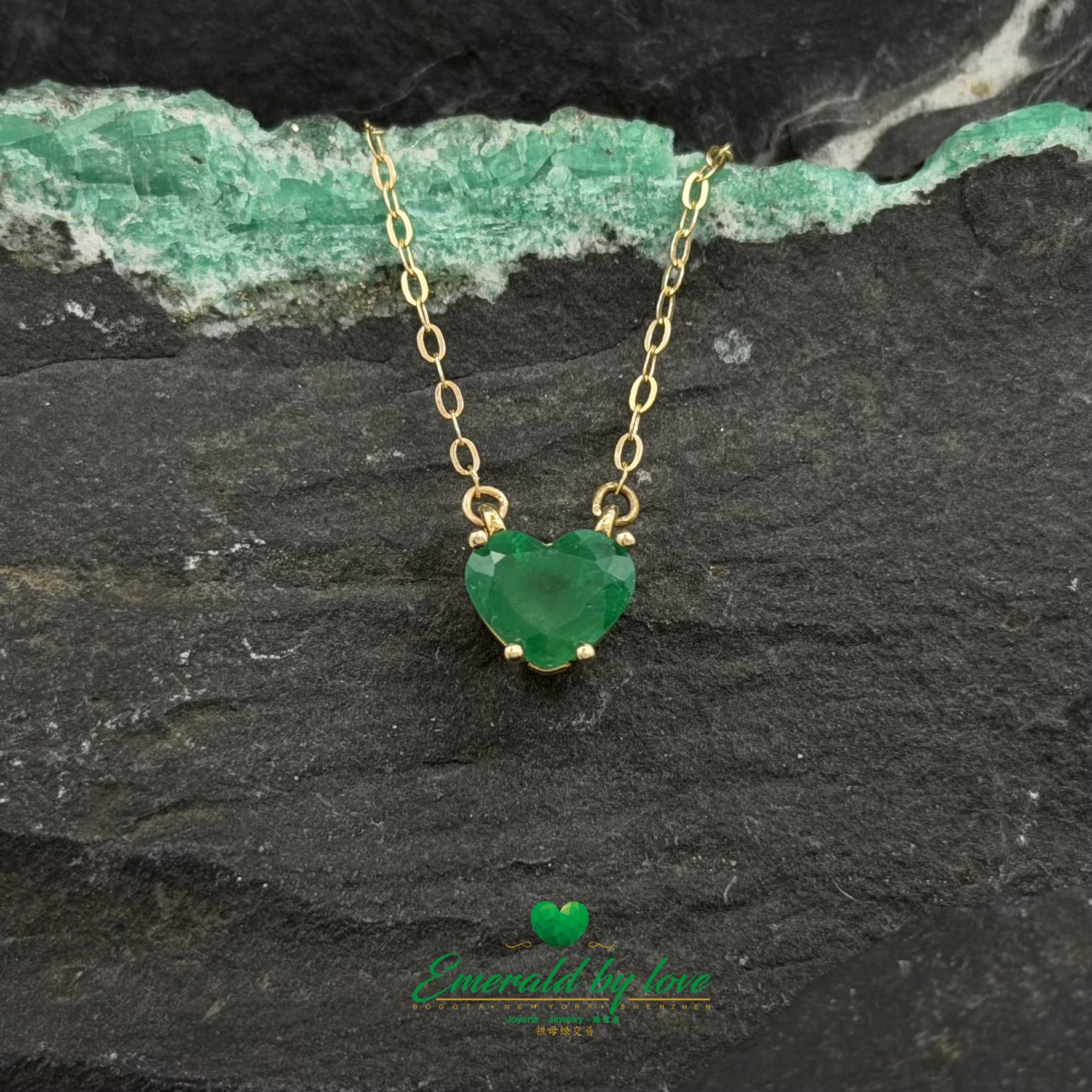 Delicate and beautiful Yellow Gold Heart Emerald Pendant with Three-Prong Setting