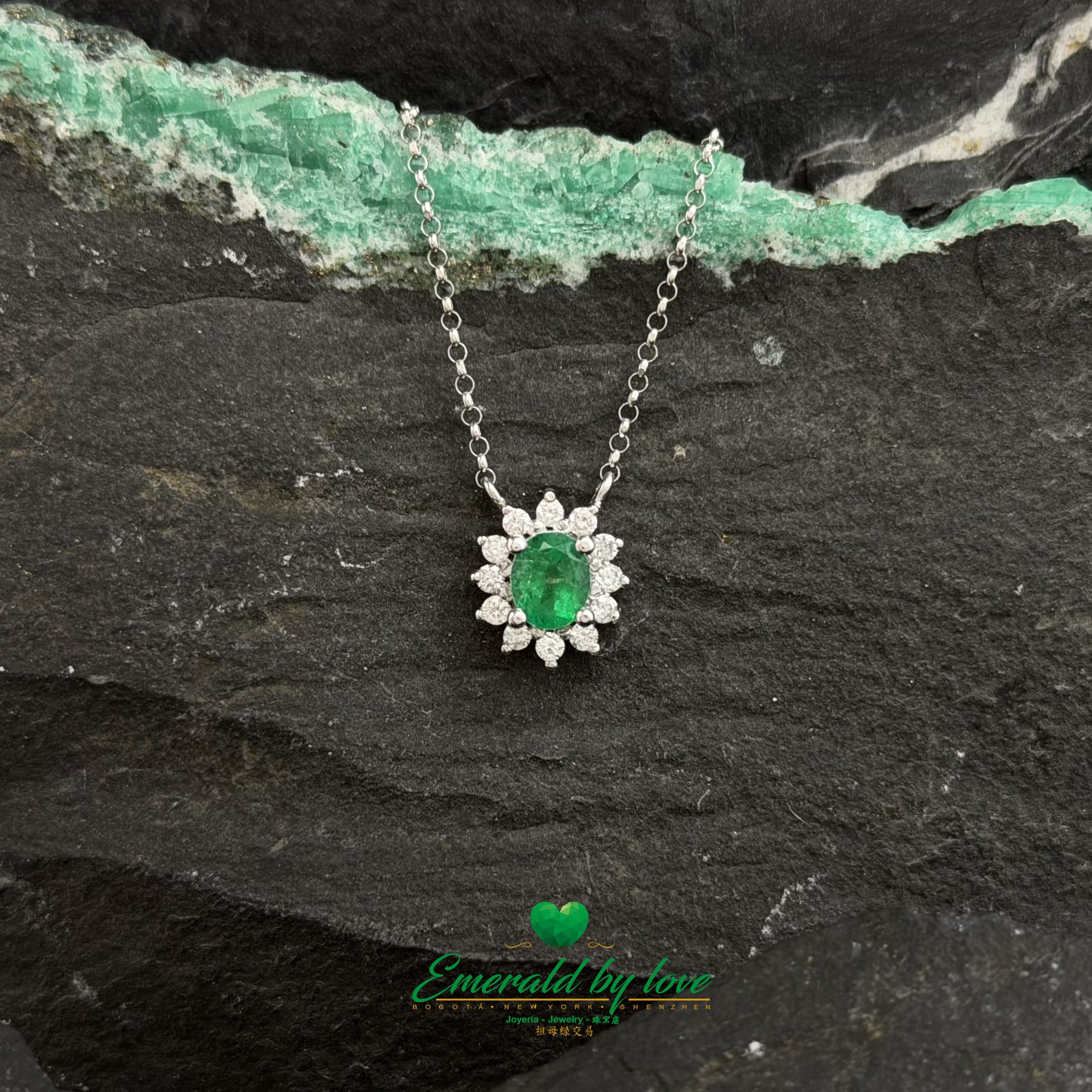 White Gold Floral Pendant with Oval Emerald and Diamonds