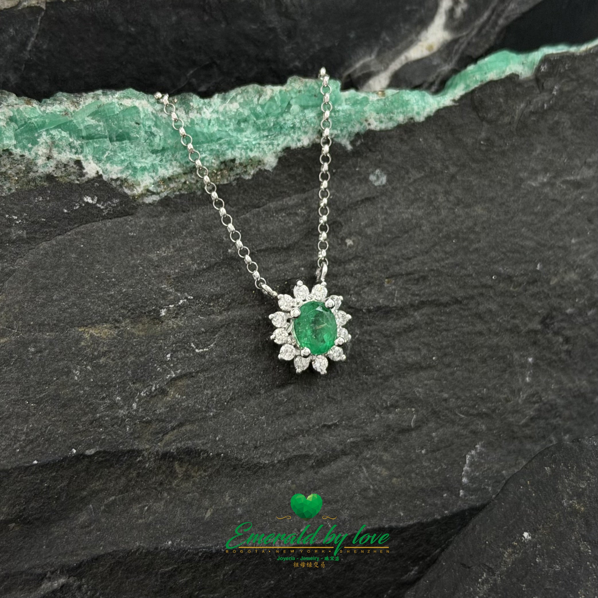 White Gold Floral Pendant with Oval Emerald and Diamonds