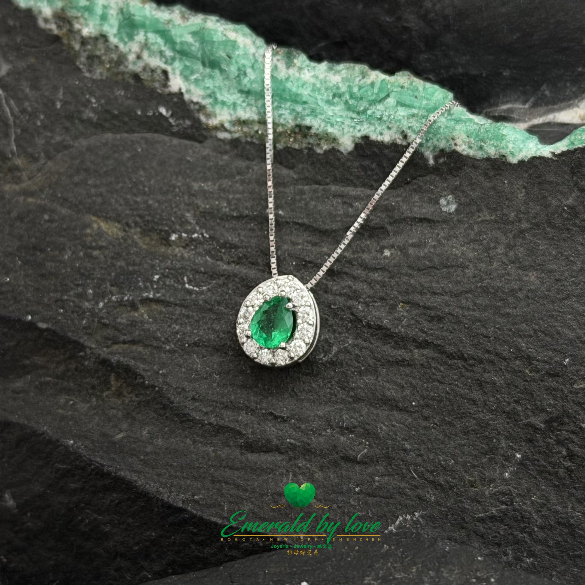 White Gold Cluster Pendant with Pear-Shaped Emerald and Diamonds
