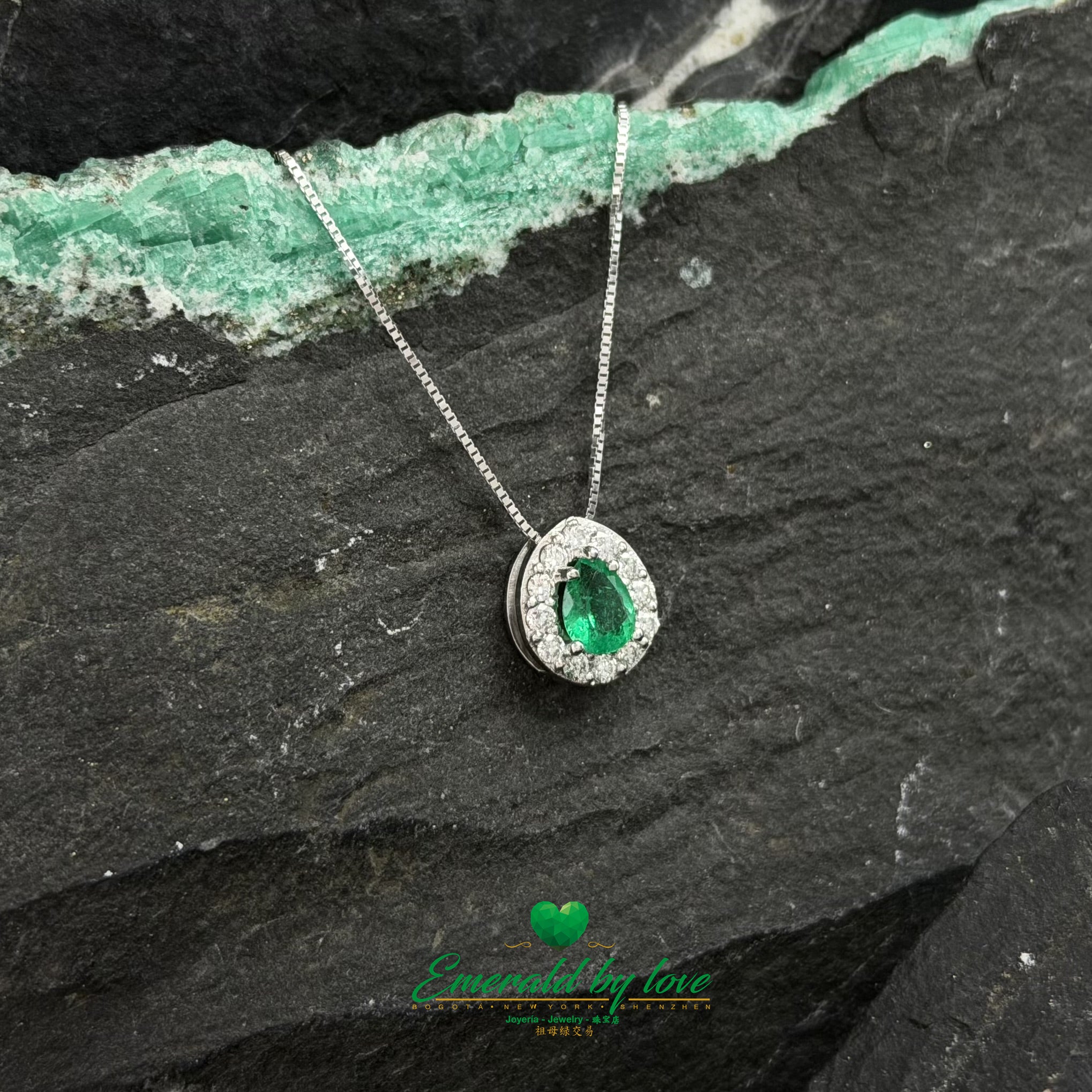 White Gold Cluster Pendant with Pear-Shaped Emerald and Diamonds