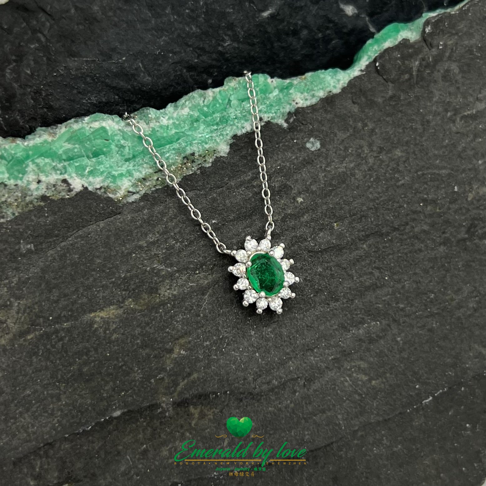 Elongated Flower Pendant with Oval Crystal Emerald