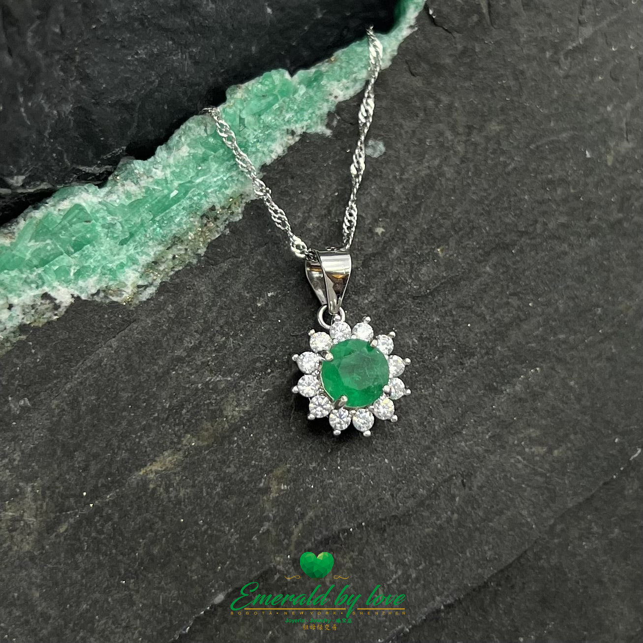 Multi-Petal Flower Pendant with Central Round Emerald and Surrounding Cubic Zirconia