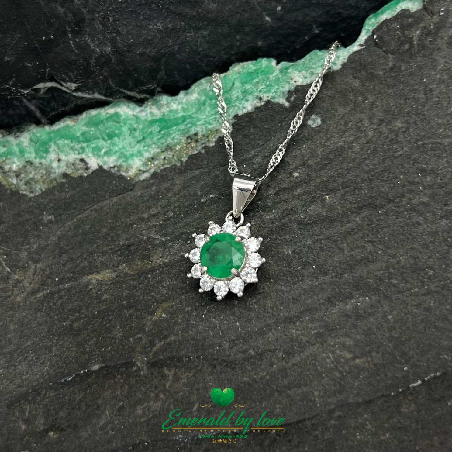 Multi-Petal Flower Pendant with Central Round Emerald and Surrounding Cubic Zirconia