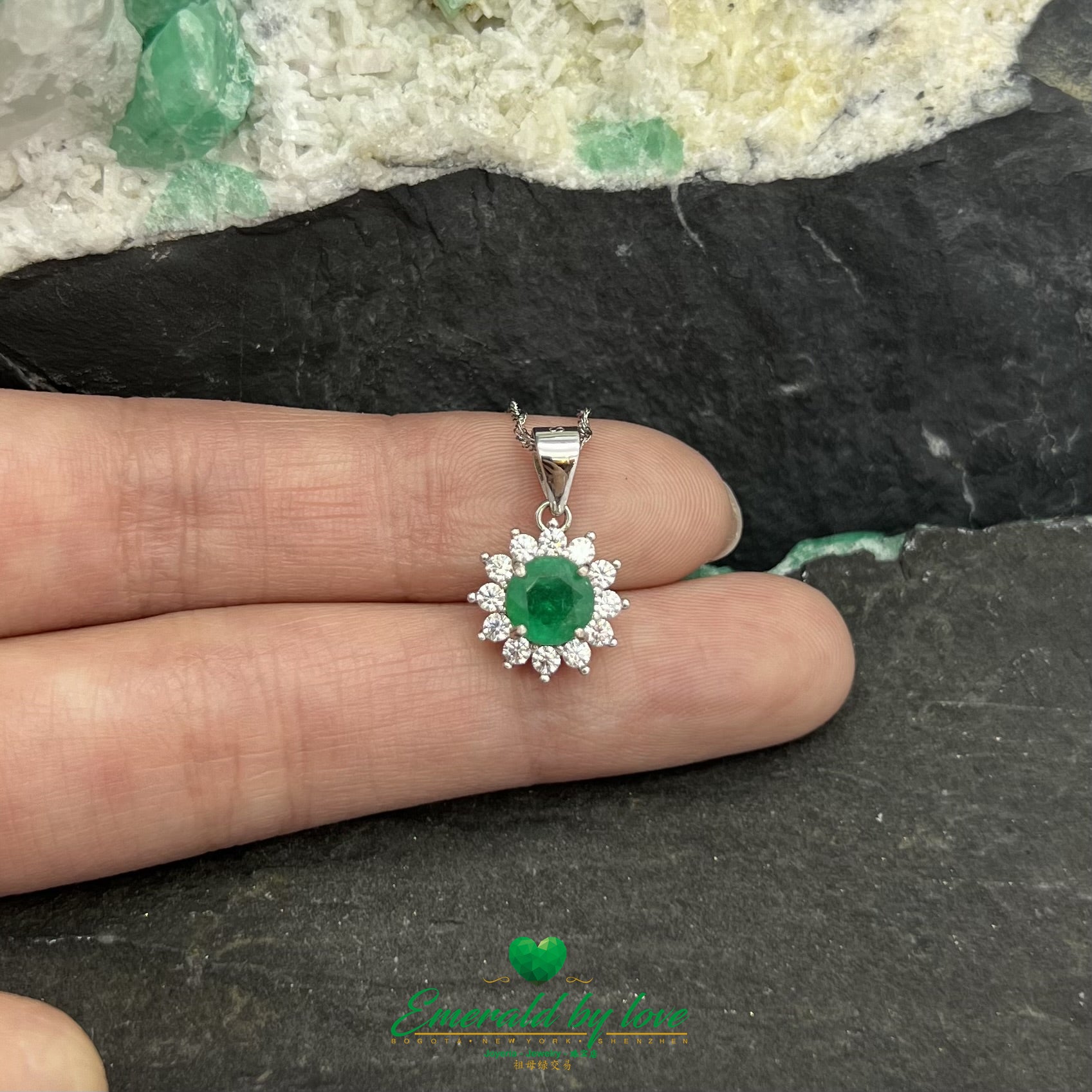 Multi-Petal Flower Pendant with Central Round Emerald and Surrounding Cubic Zirconia