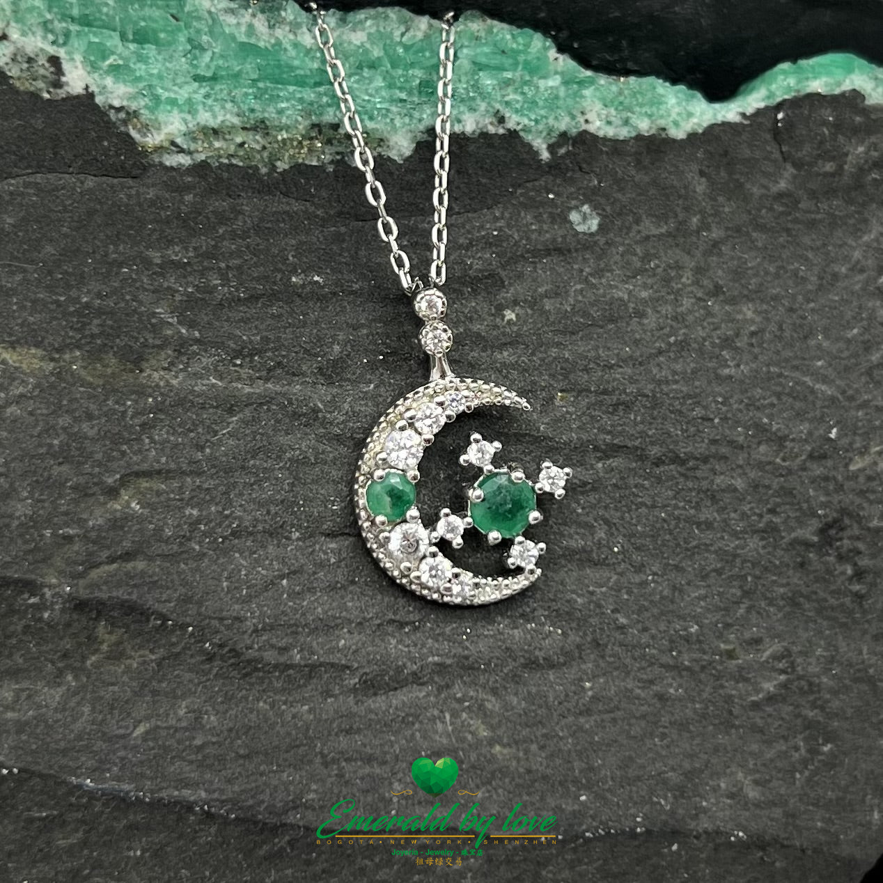 Double Crescent Moon and Star Pendant with Round Central Emeralds