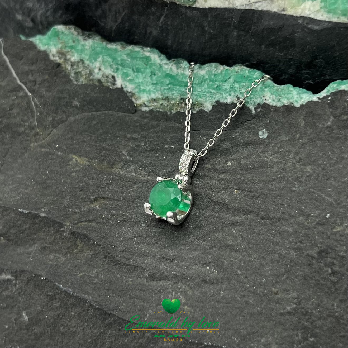 Elegant Round Emerald Pendant with Four-Prong Setting