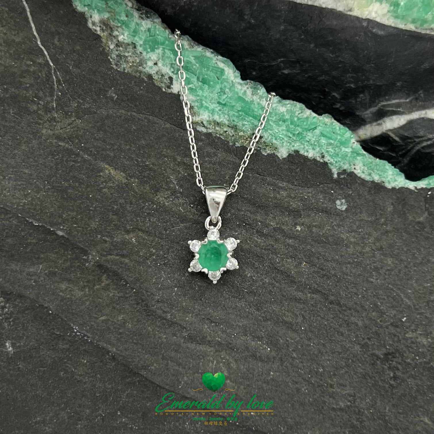 Small Six-Petal Flower Pendant with Round Central Emerald