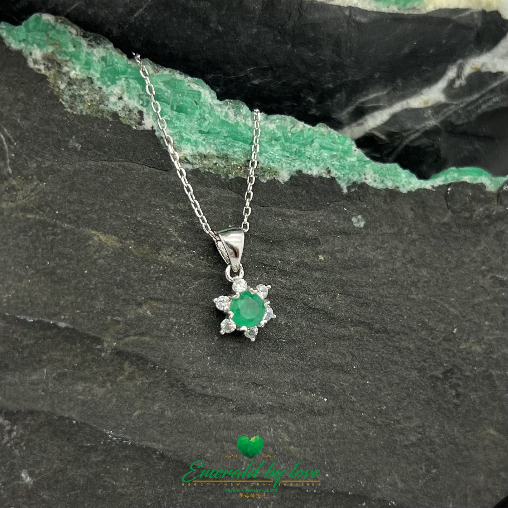 Small Six-Petal Flower Pendant with Round Central Emerald