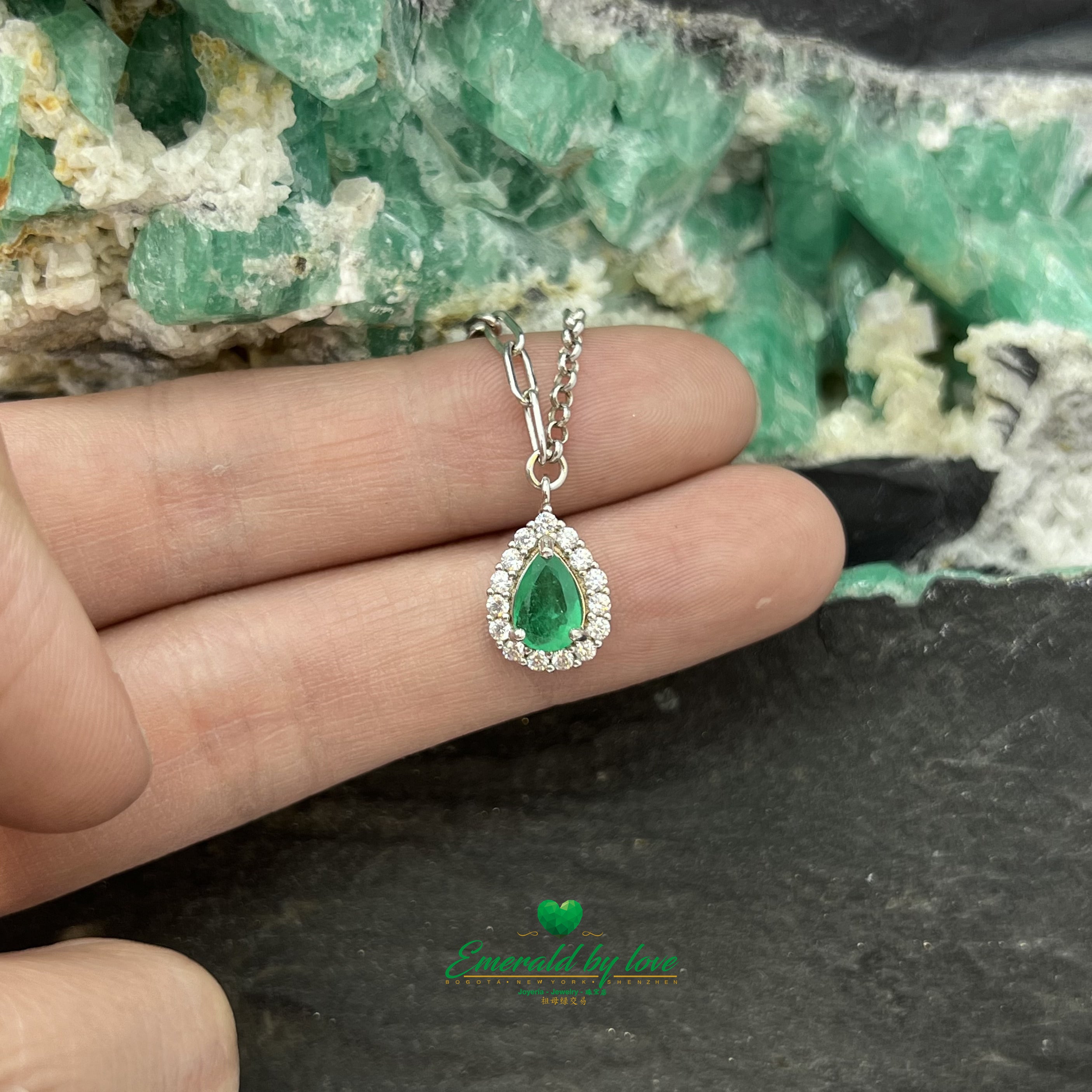 Pear-Shaped Marquise Emerald Pendant with Surrounding Cubic Zirconia and Double Chain
