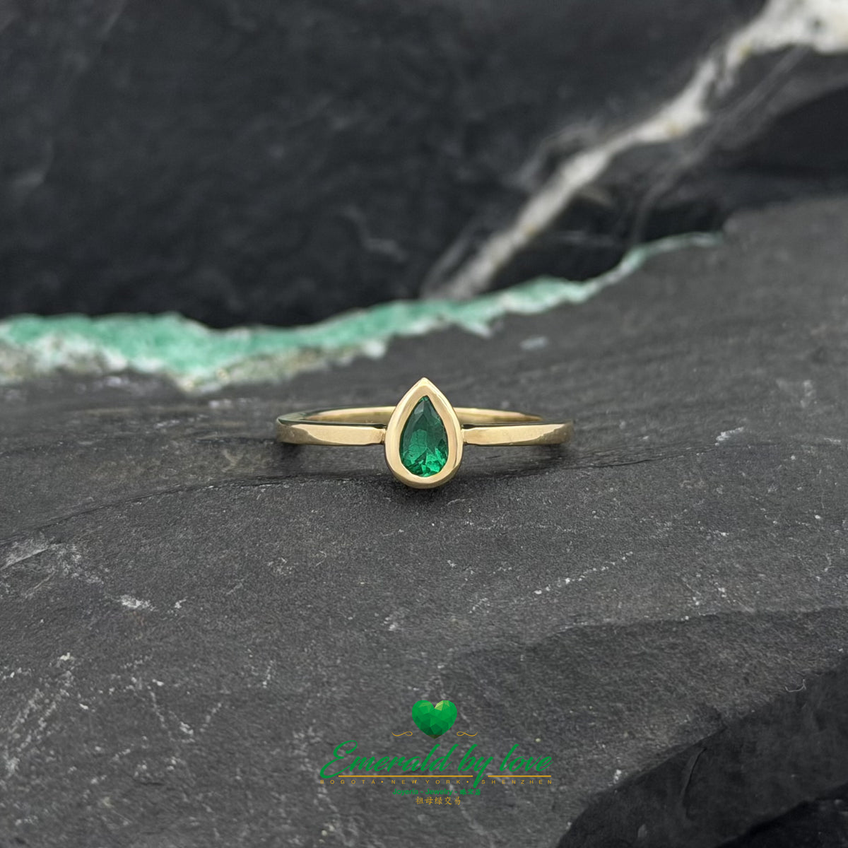 Pear-Cut Emerald Ring with Minimalist Setting