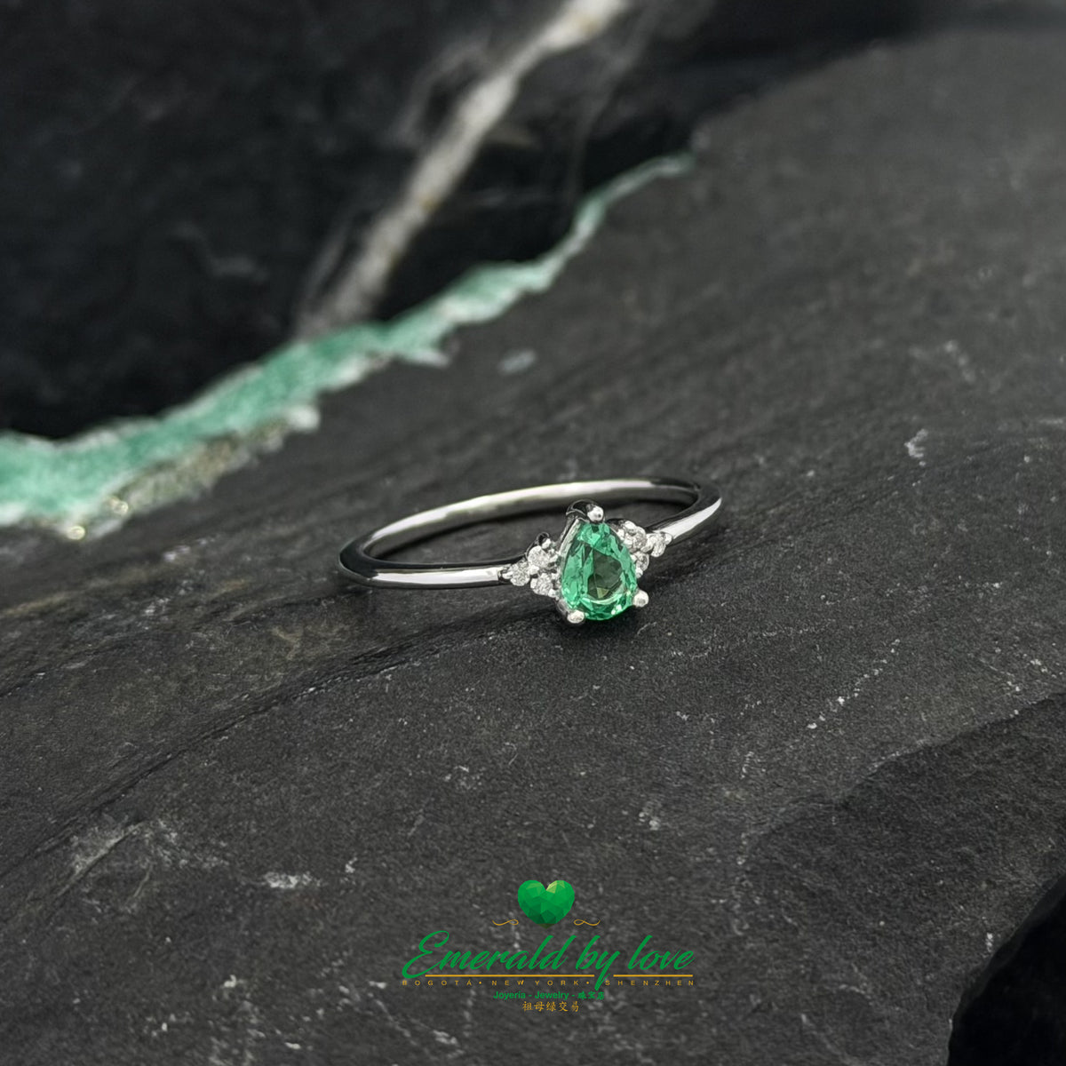 Pear Emerald and Diamond Ring in White Gold