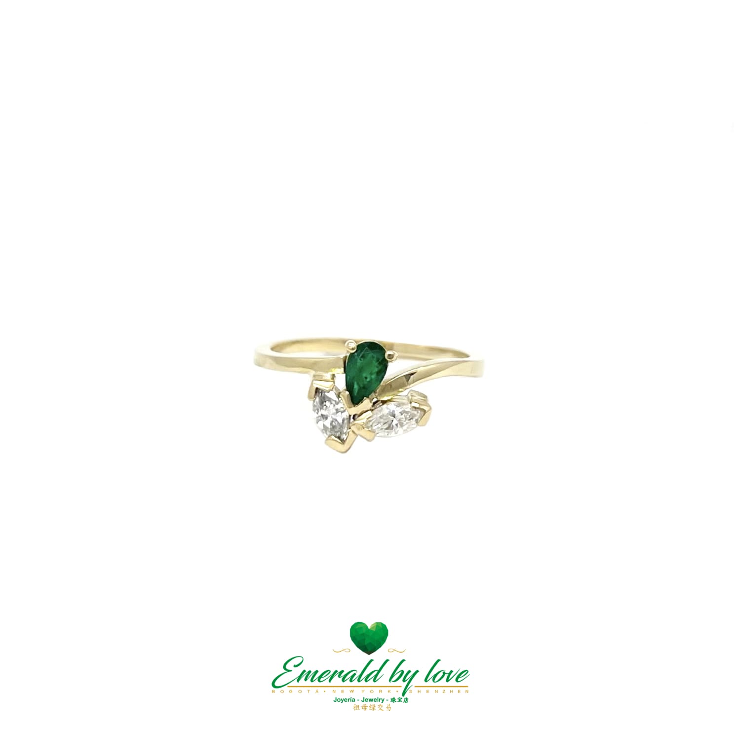 Anillo en forma de lágrima con esmeralda colombiana y dos diamantes talla marquesa