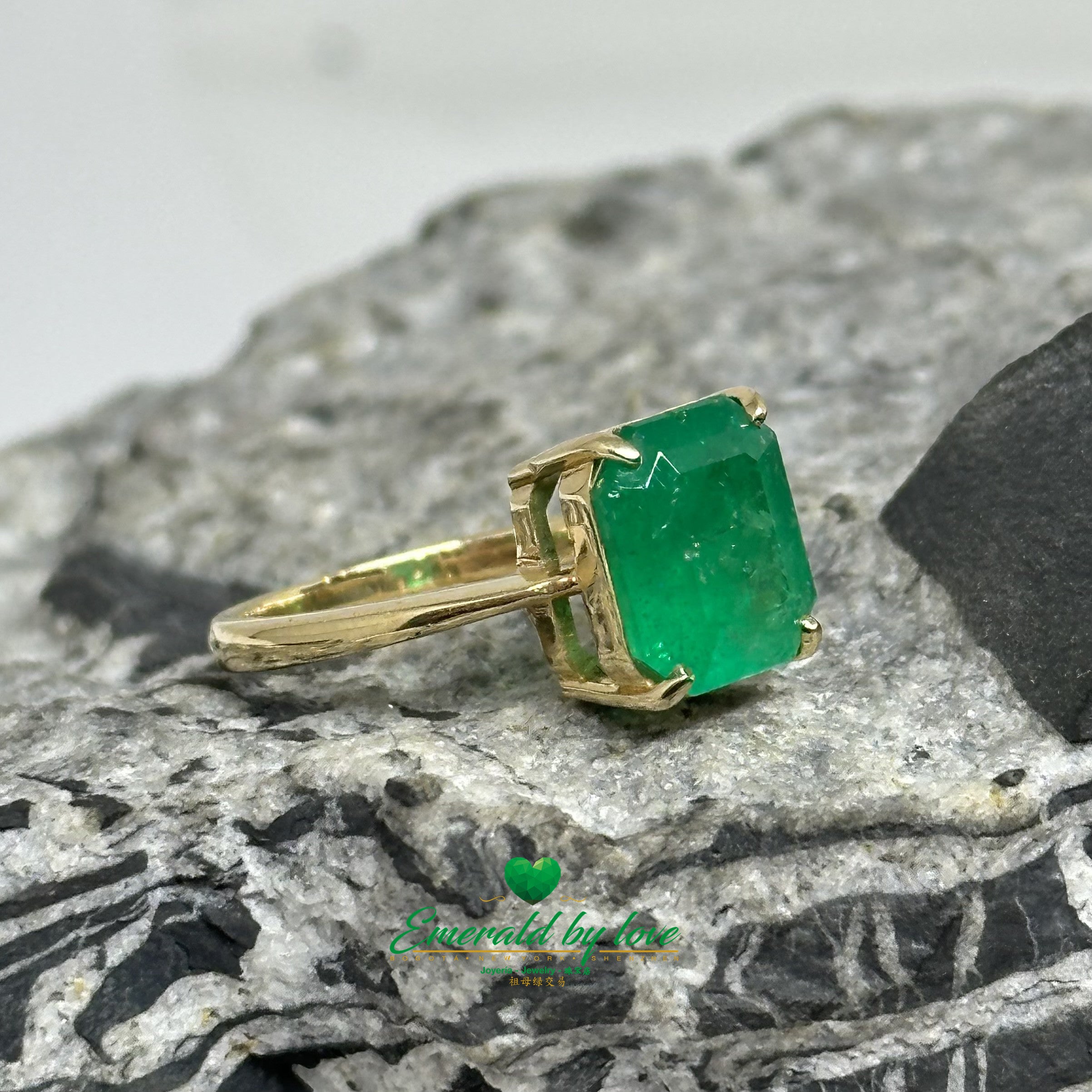 Solitaire Ring with Emerald-Cut Colombian Emerald and Four-Prong Setting