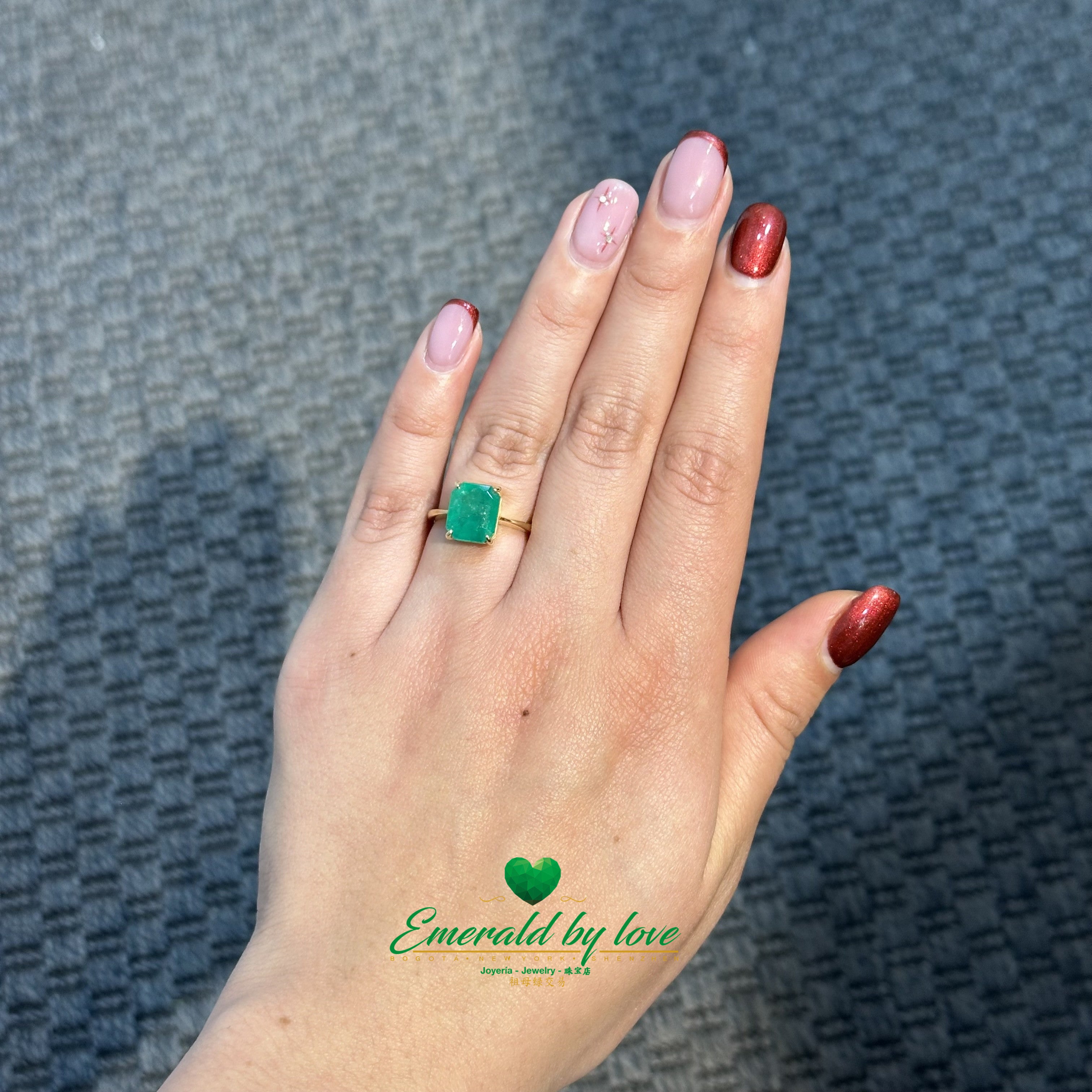 Solitaire Ring with Emerald-Cut Colombian Emerald and Four-Prong Setting